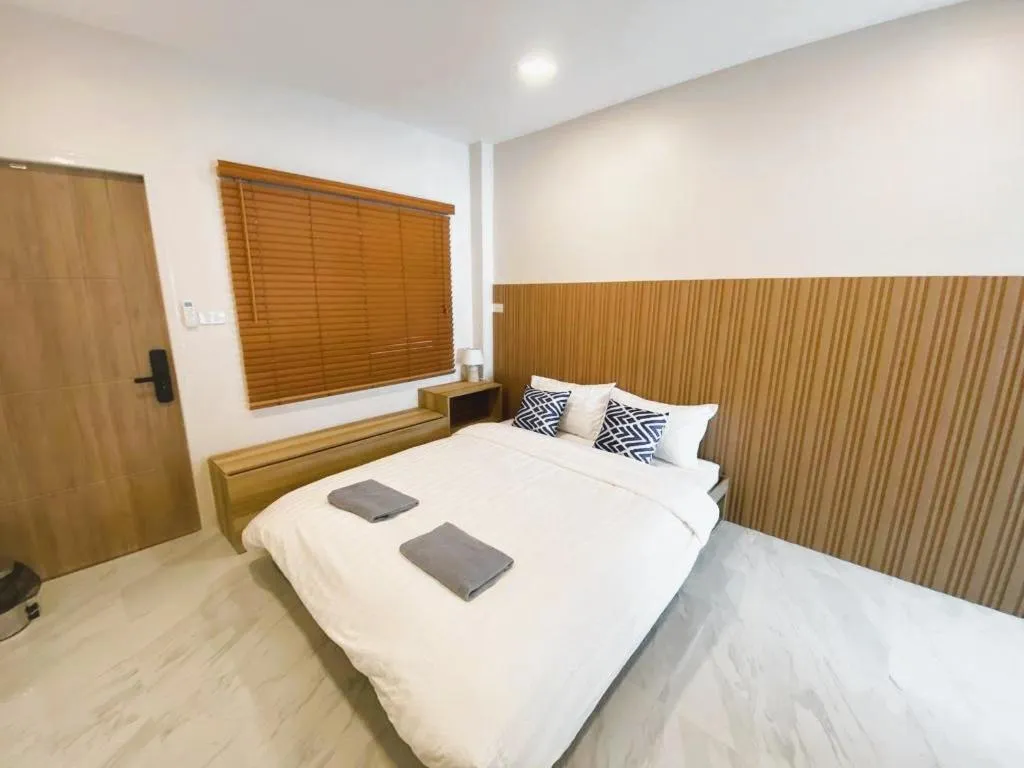 Bed in S.P.C Apartment by Brodderud