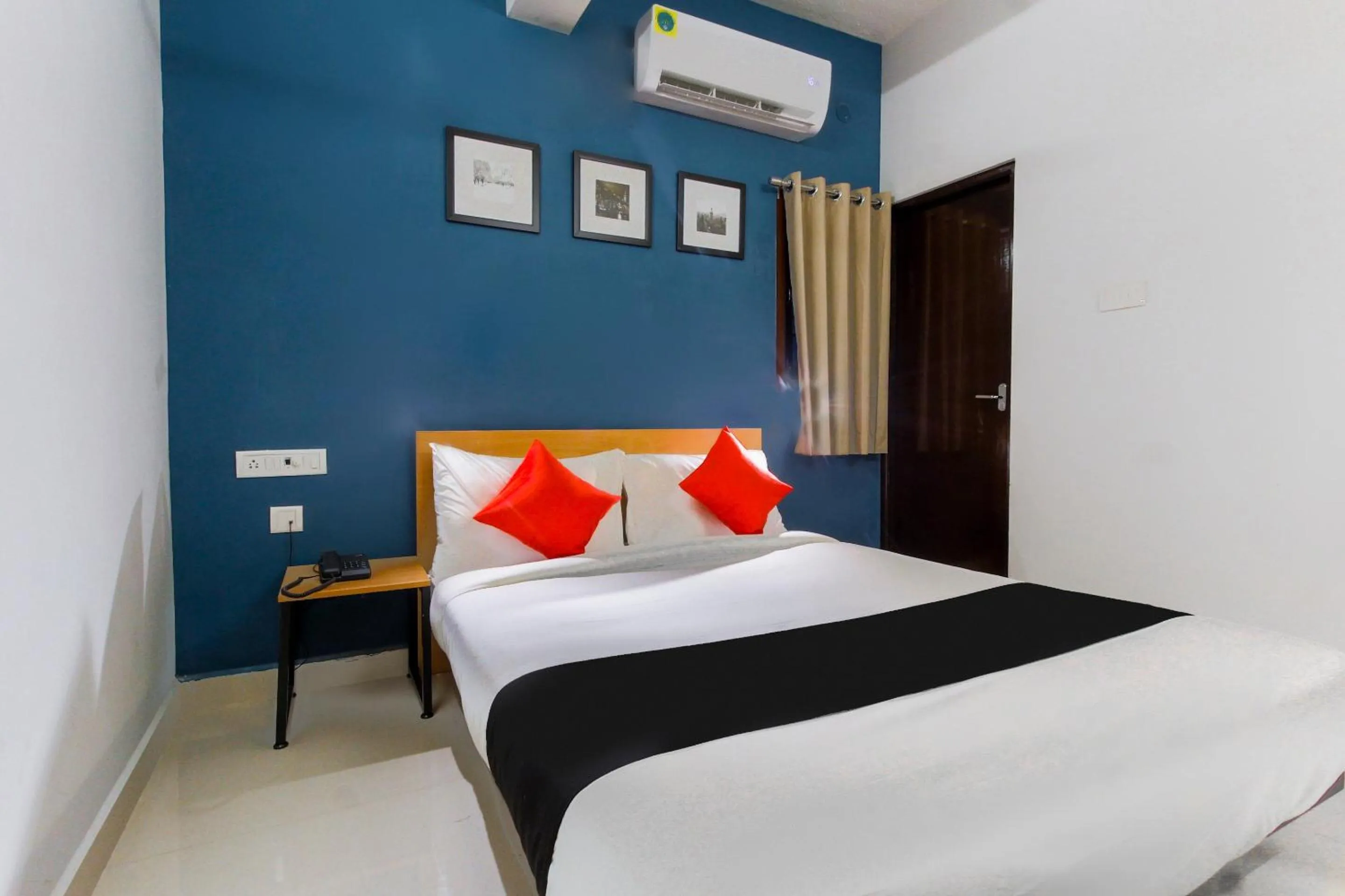Bedroom in Hotel O Murugan Rooms