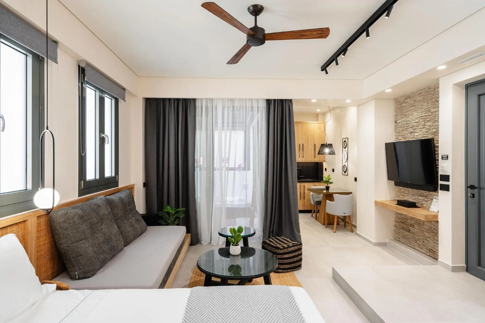 Seating area, Bed in Legato Spa Suites