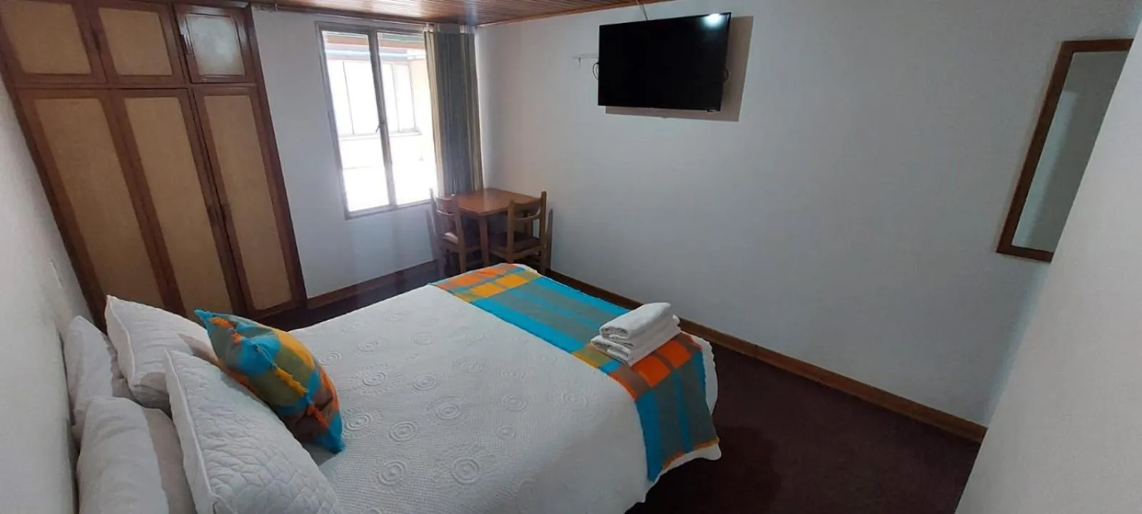 Bed in HOTEL SUAREL CENTER