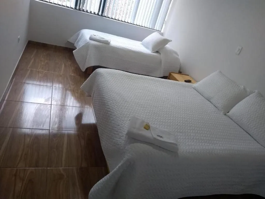 Bed in HOTEL SUAREL CENTER