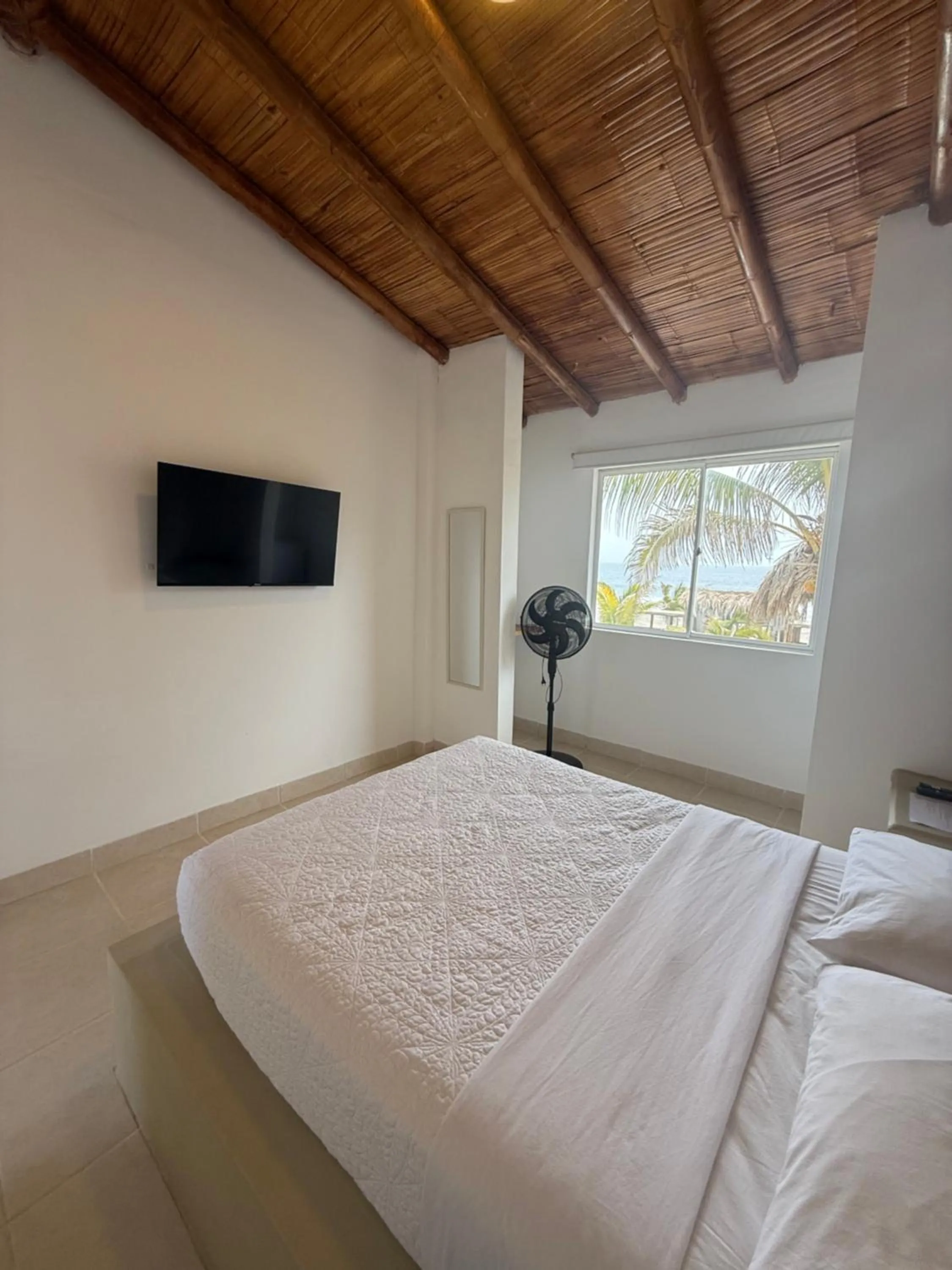 Bed in Hotel Puerto Antiguo