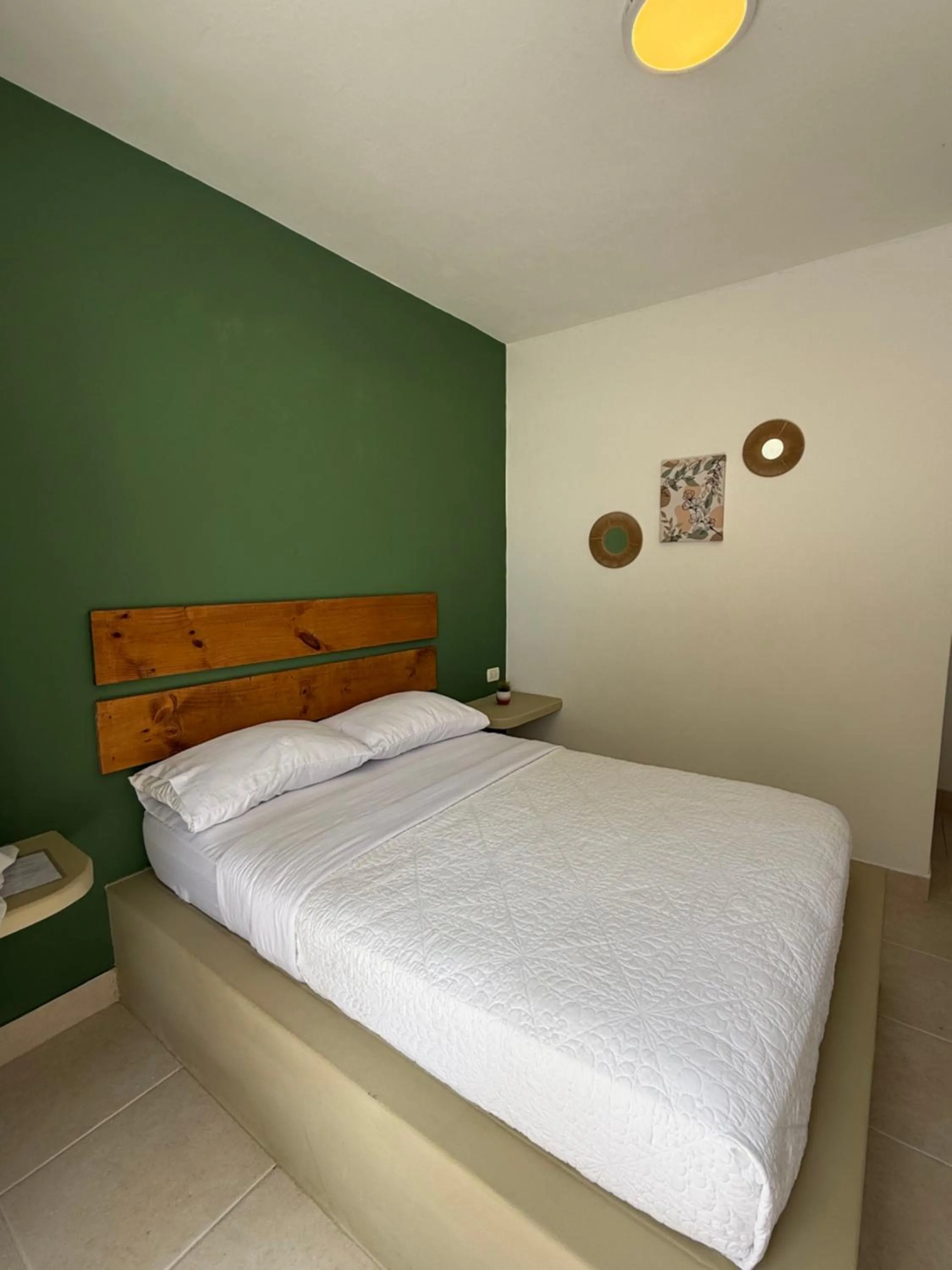 Bed in Hotel Puerto Antiguo