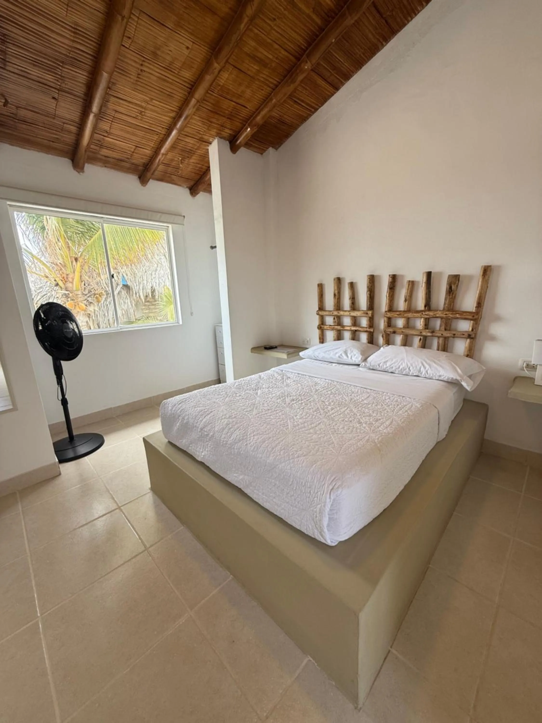 Bed in Hotel Puerto Antiguo