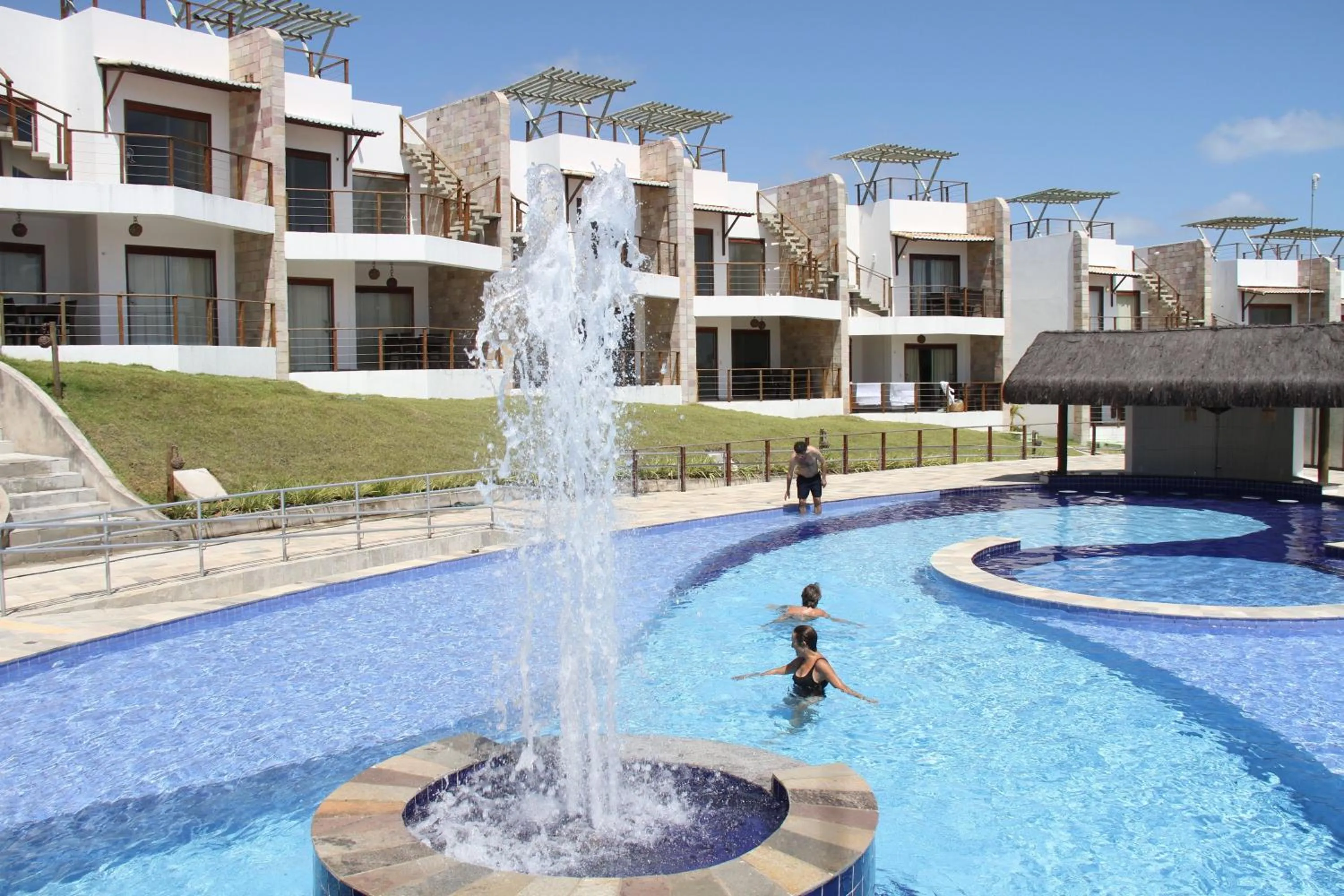 Swimming pool in Indulge and Relax Apartment