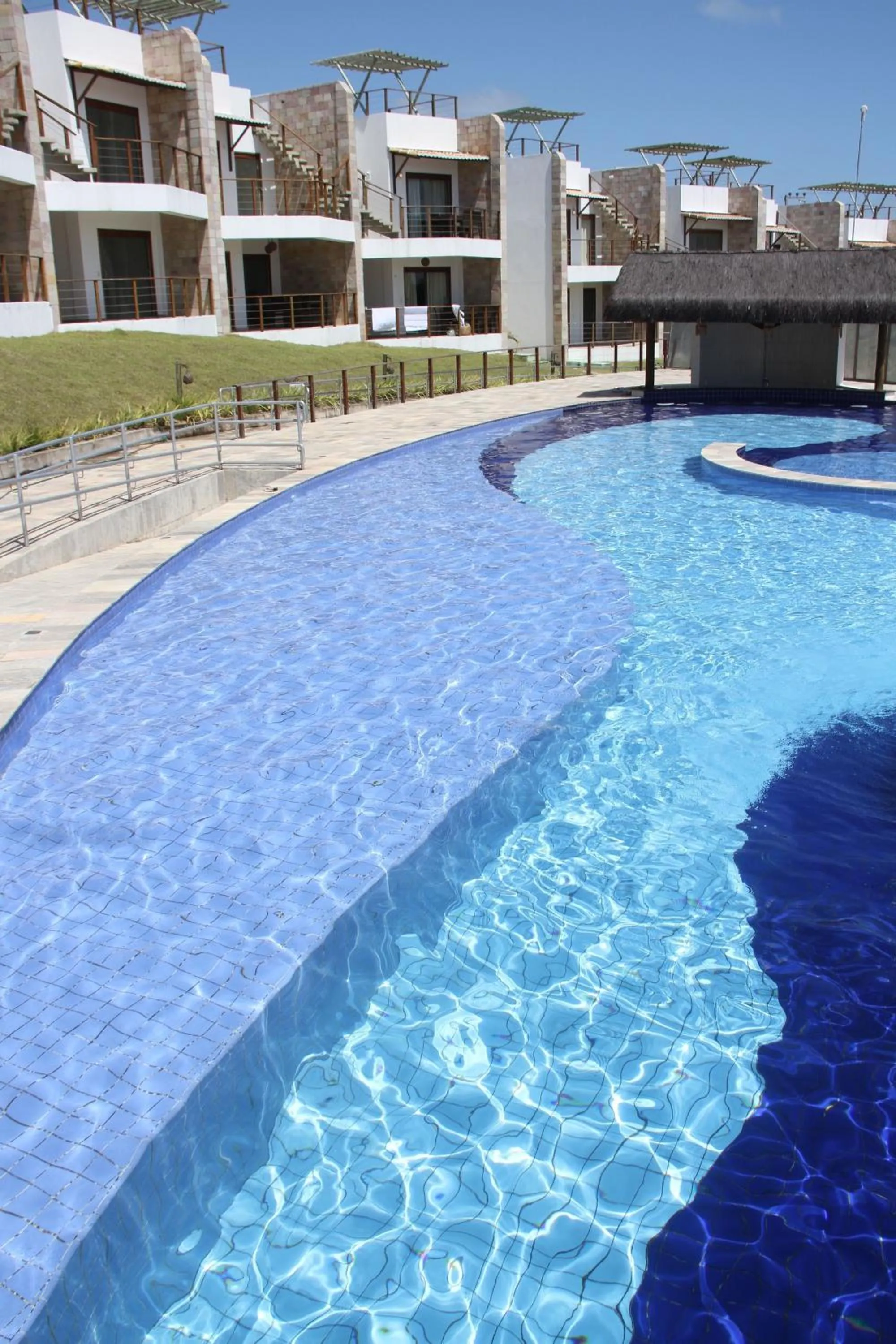 Swimming pool in Indulge and Relax Apartment
