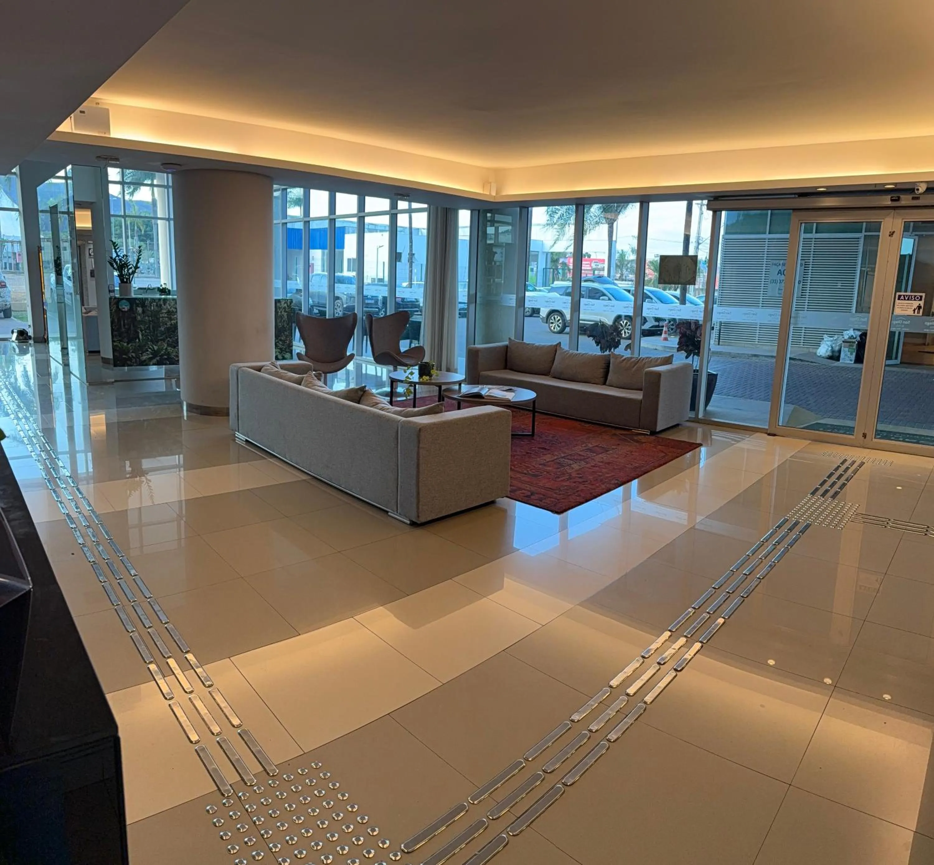 Lobby or reception in San Diego Suites Veredas Sete Lagoas