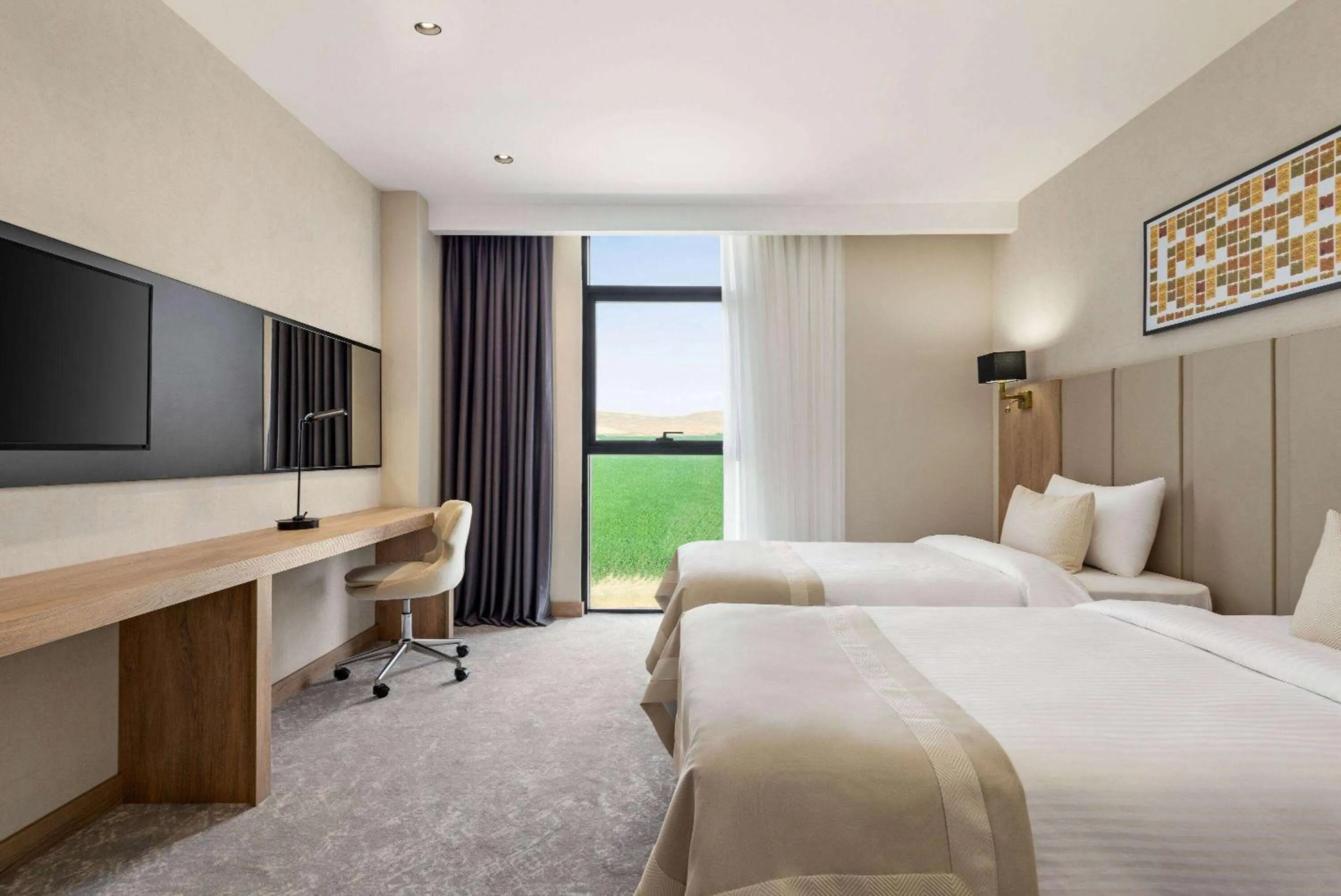 Photo of the whole room, Bed in Ramada Plaza By Wyndham Batman