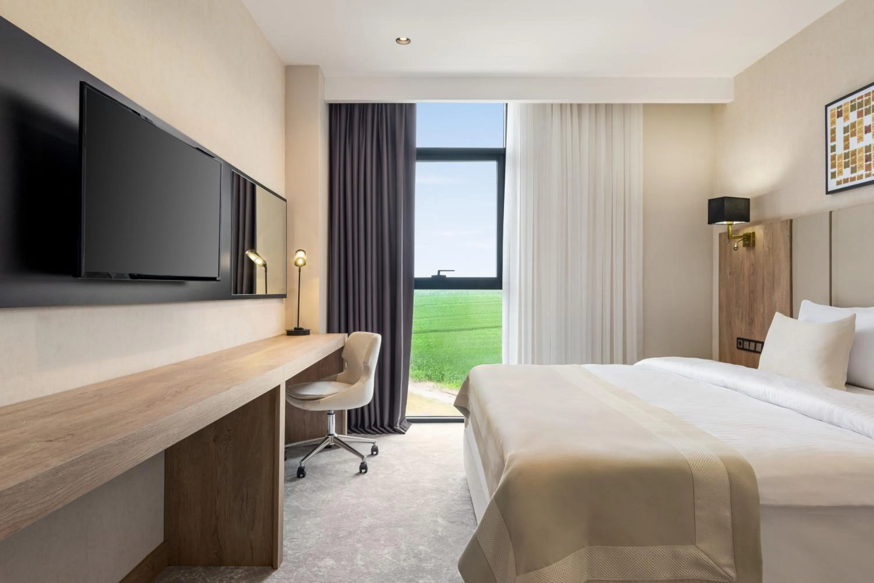 Bedroom, Bed in Ramada Plaza By Wyndham Batman