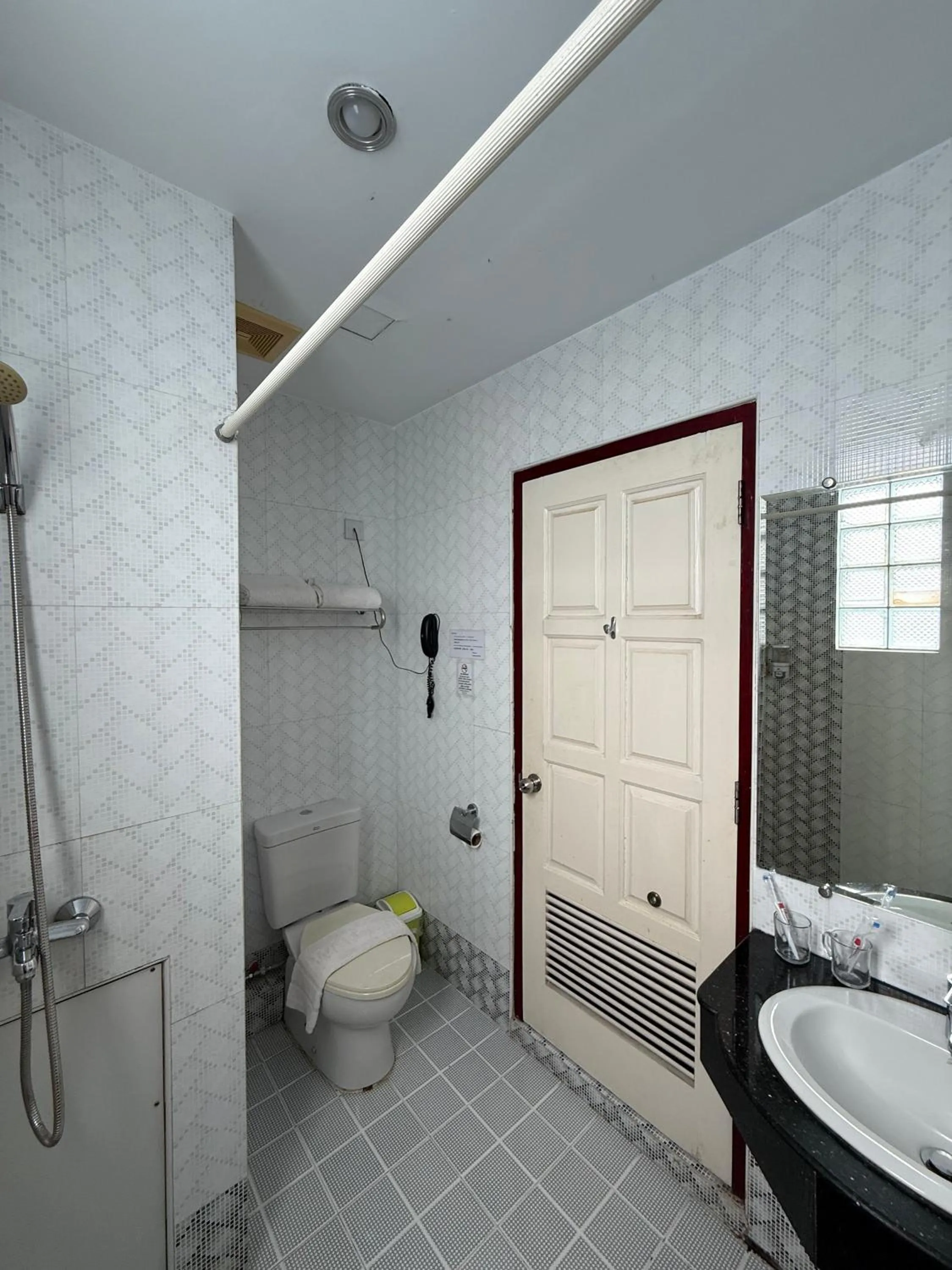 Toilet in Grand Laurel Hotel