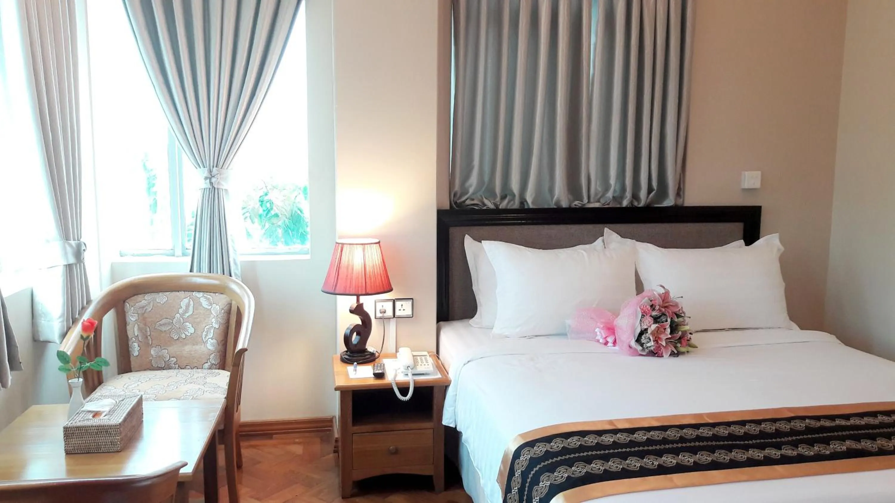 Decorative detail, Bed in Grand Laurel Hotel