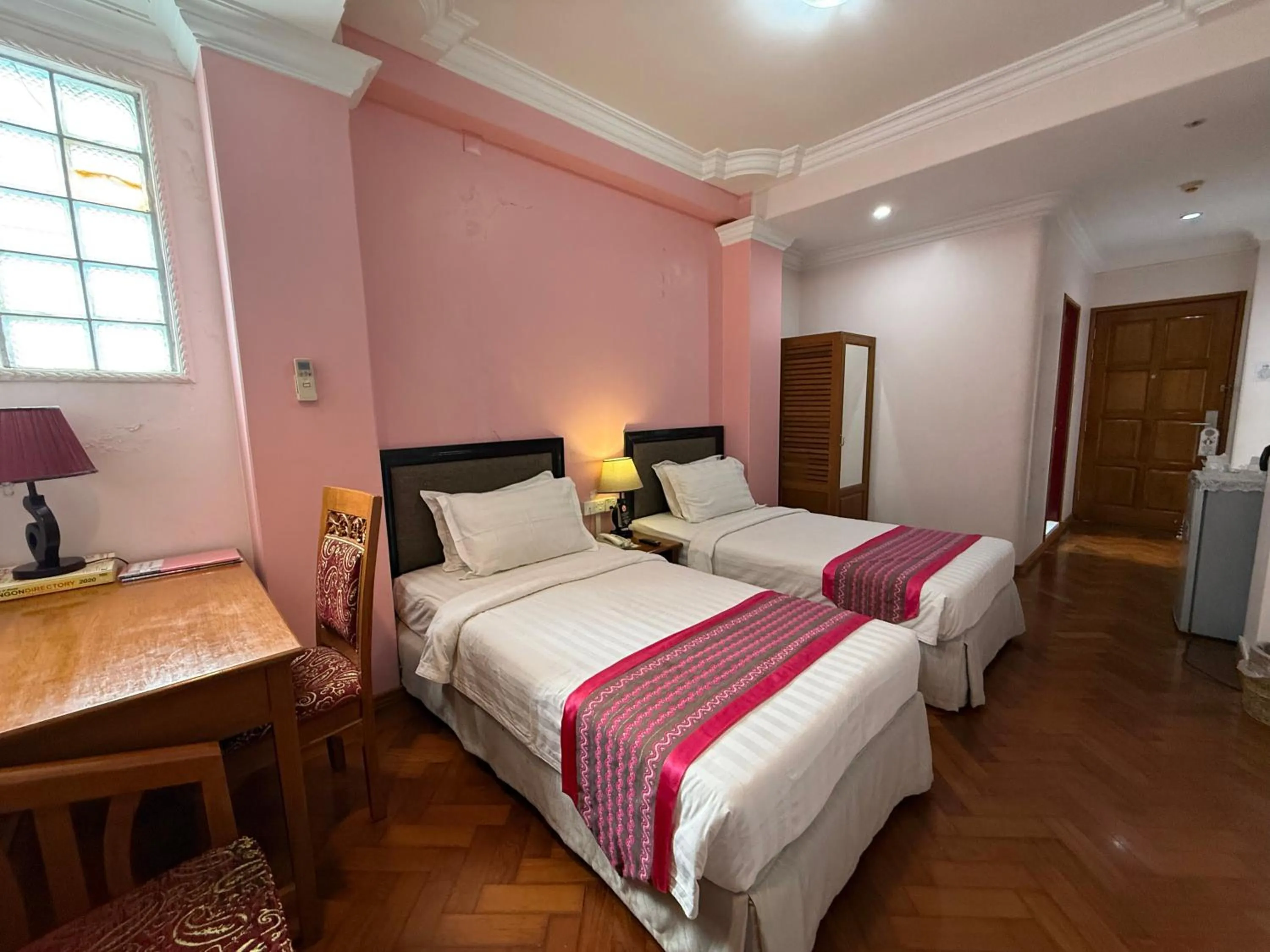 Bed in Grand Laurel Hotel