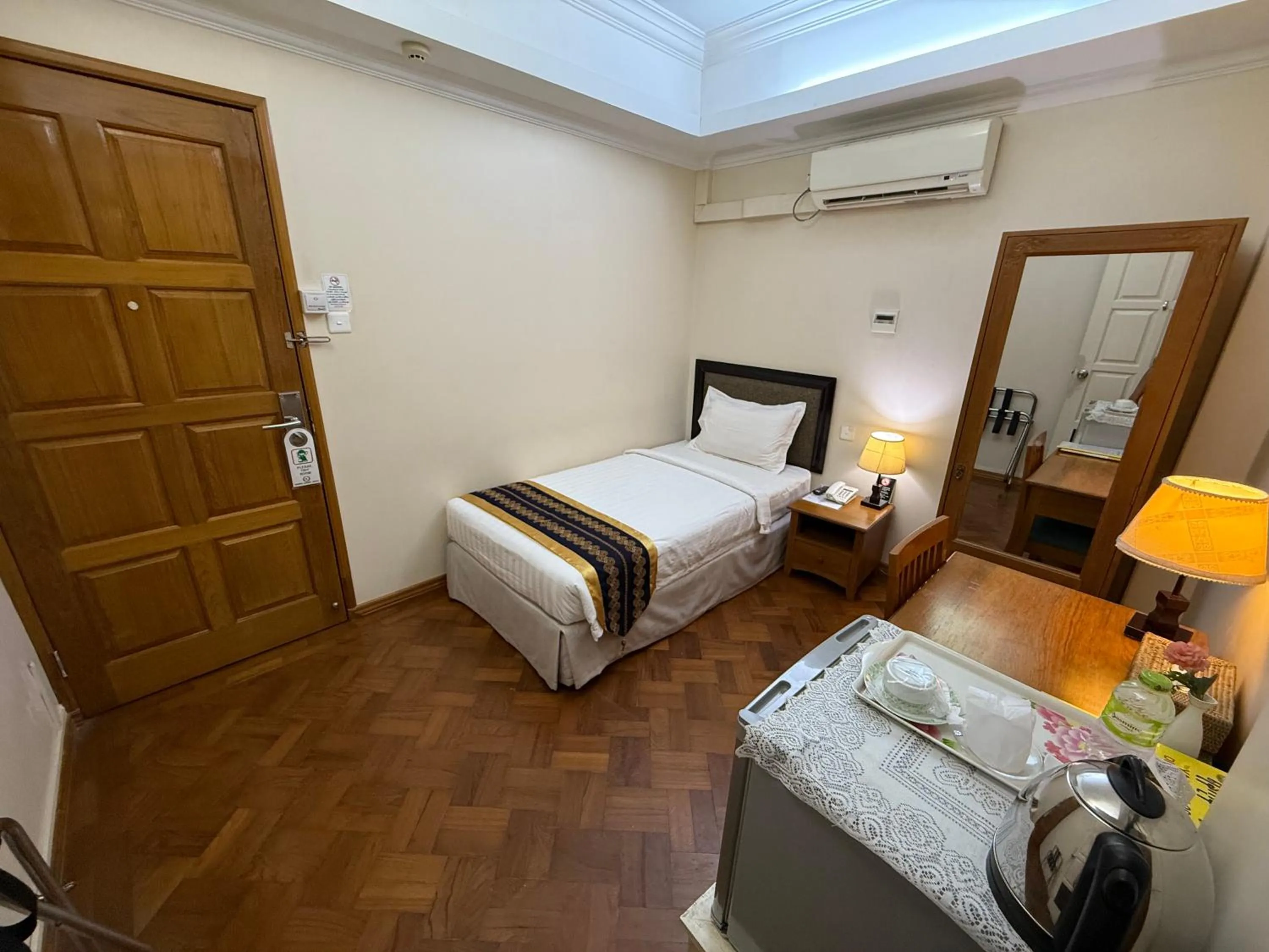 Bed in Grand Laurel Hotel