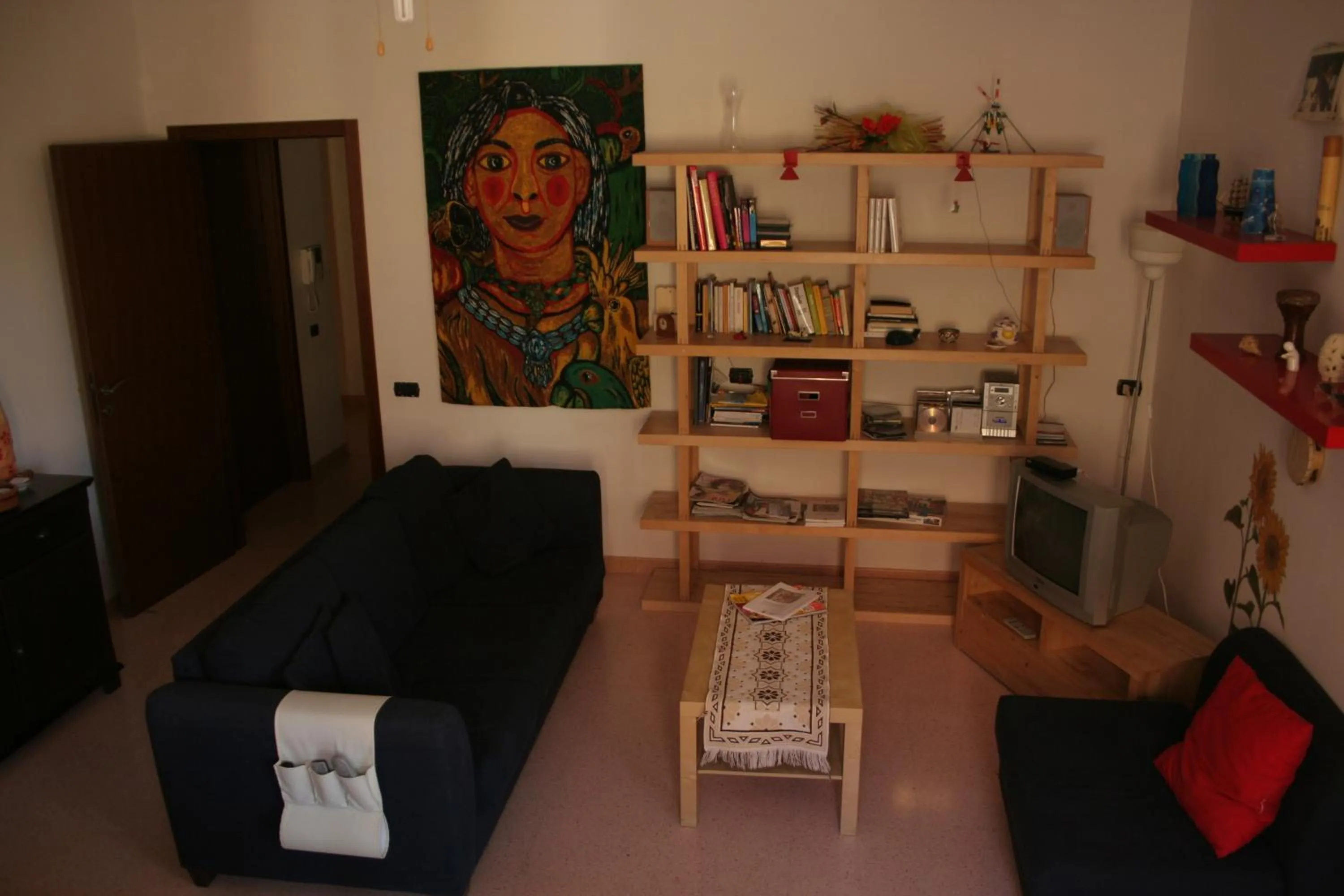 Communal lounge/ TV room in Casa di Marco