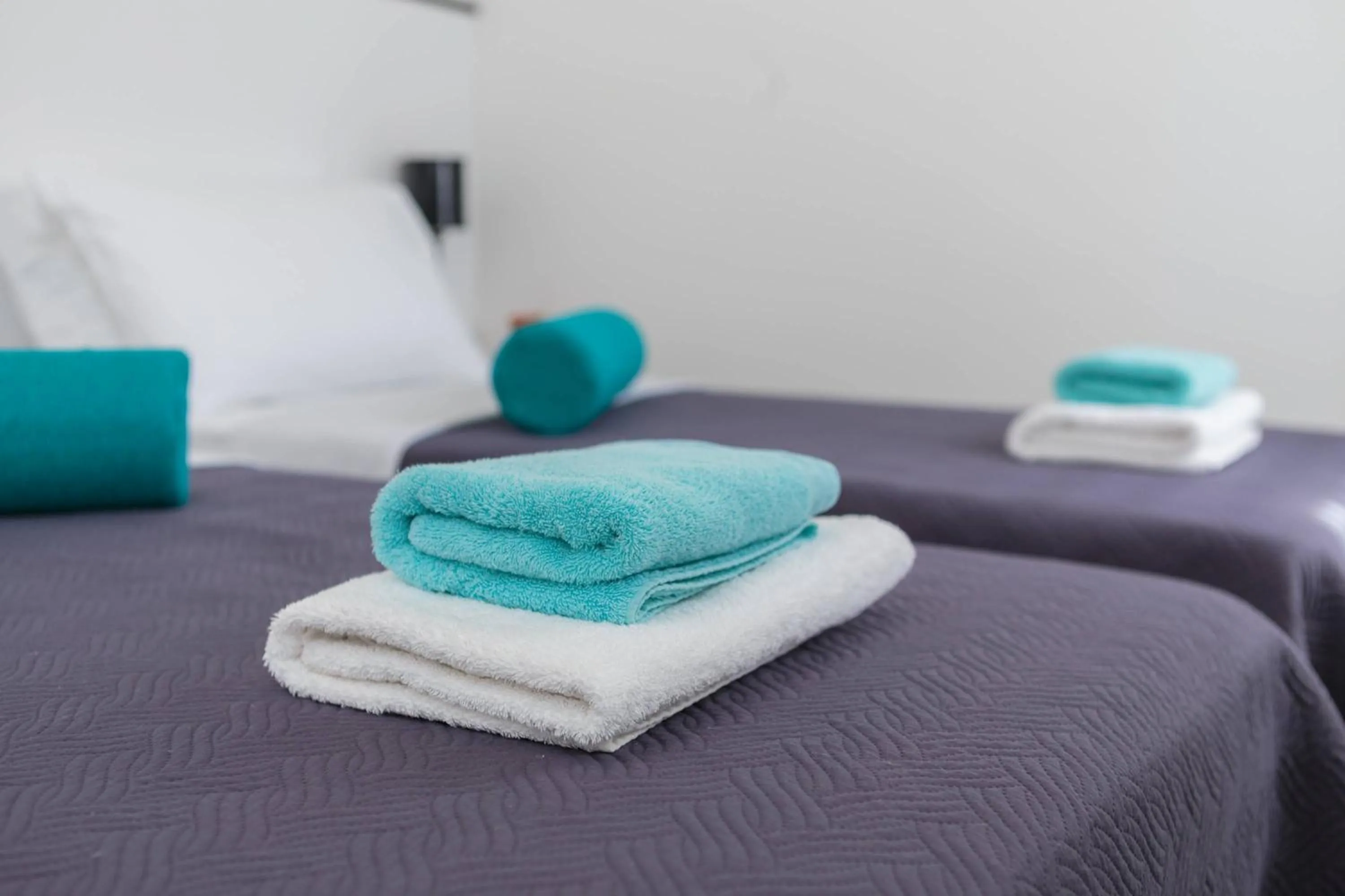 Bed in PLR Luxury Rooms