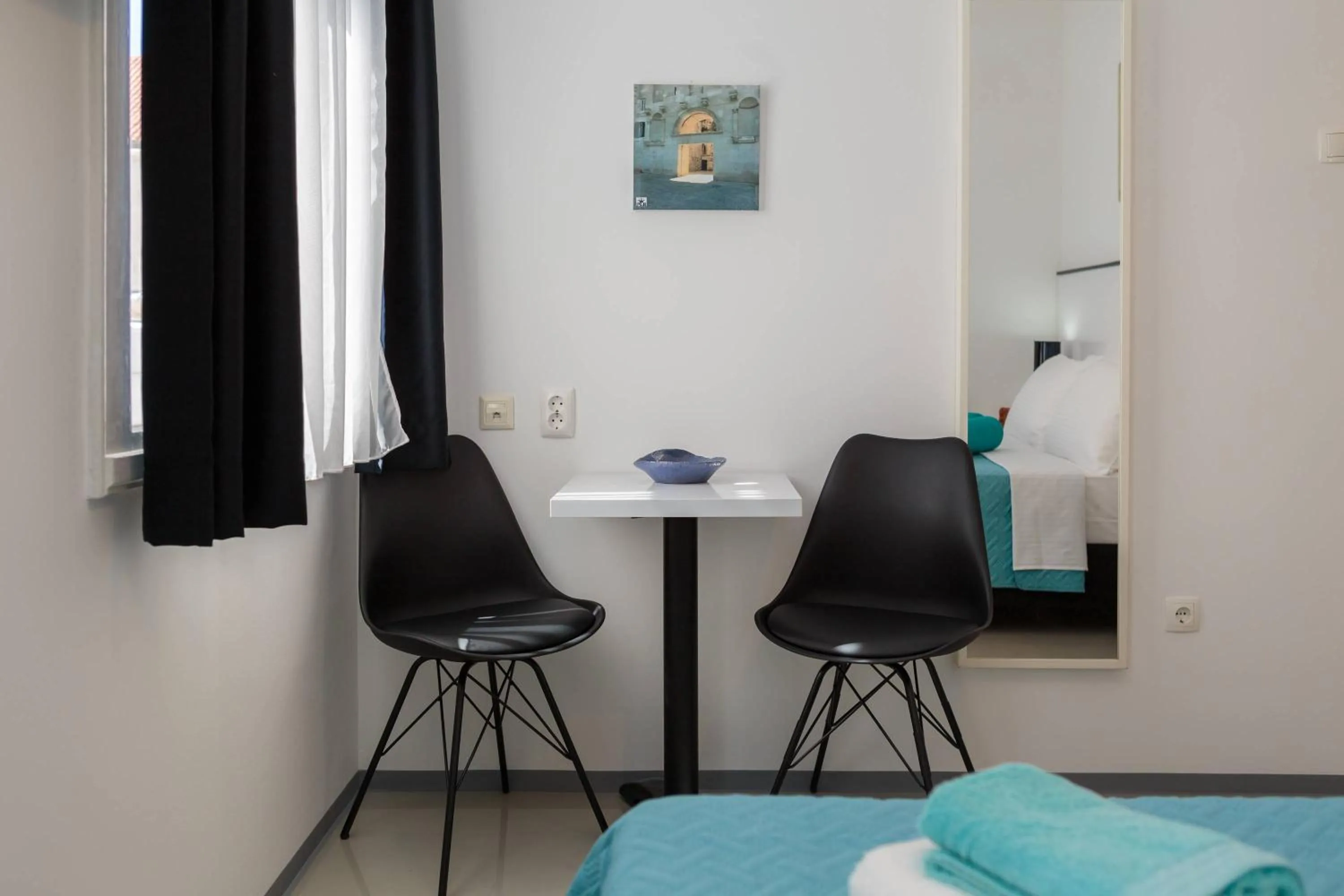 Bed in PLR Luxury Rooms