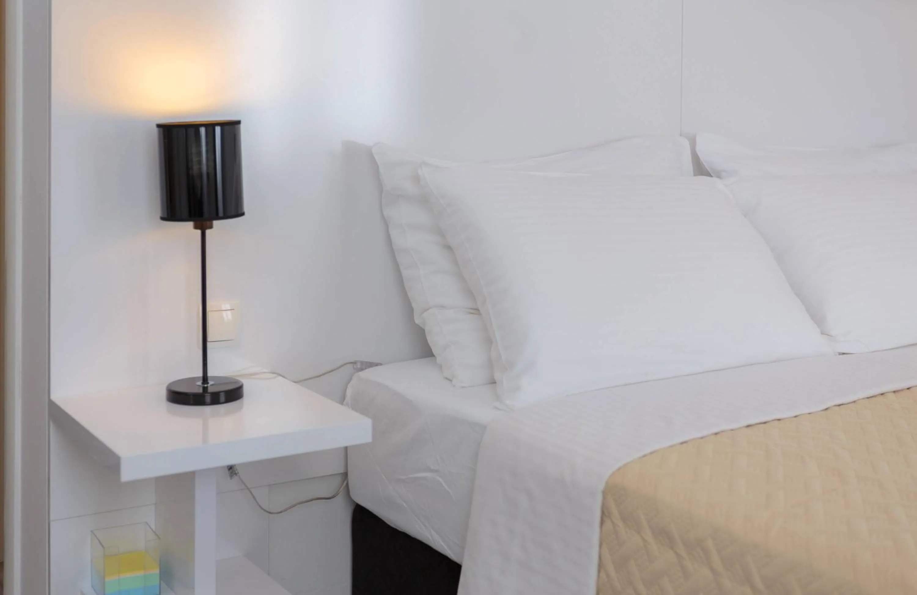 Bed in PLR Luxury Rooms