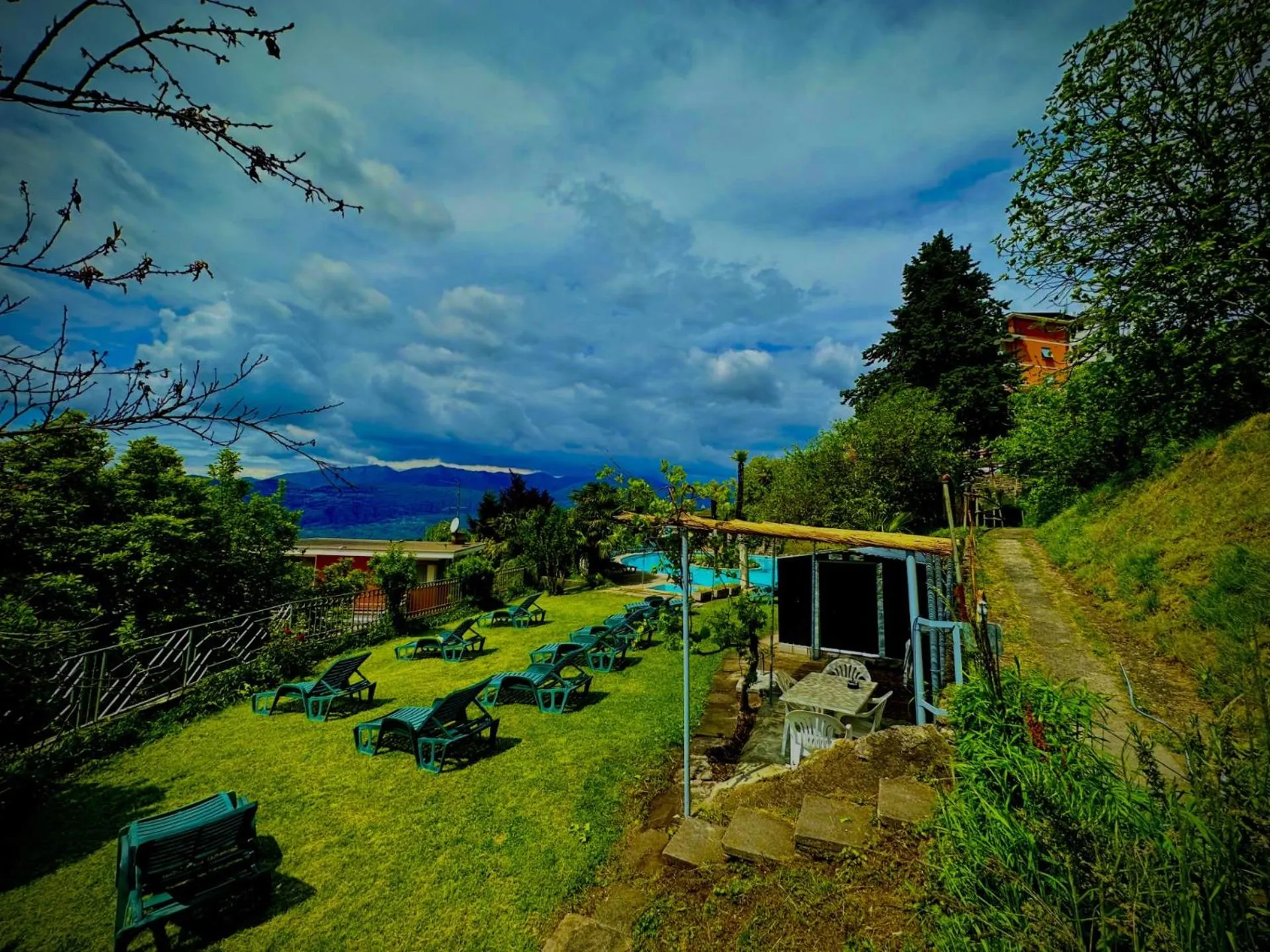 Swimming pool in Hotel Colibrì