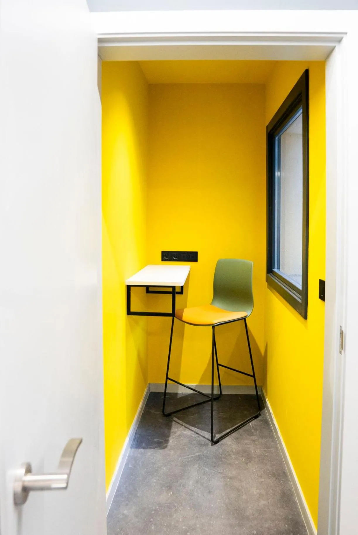 Seating area in Coliving Compostela
