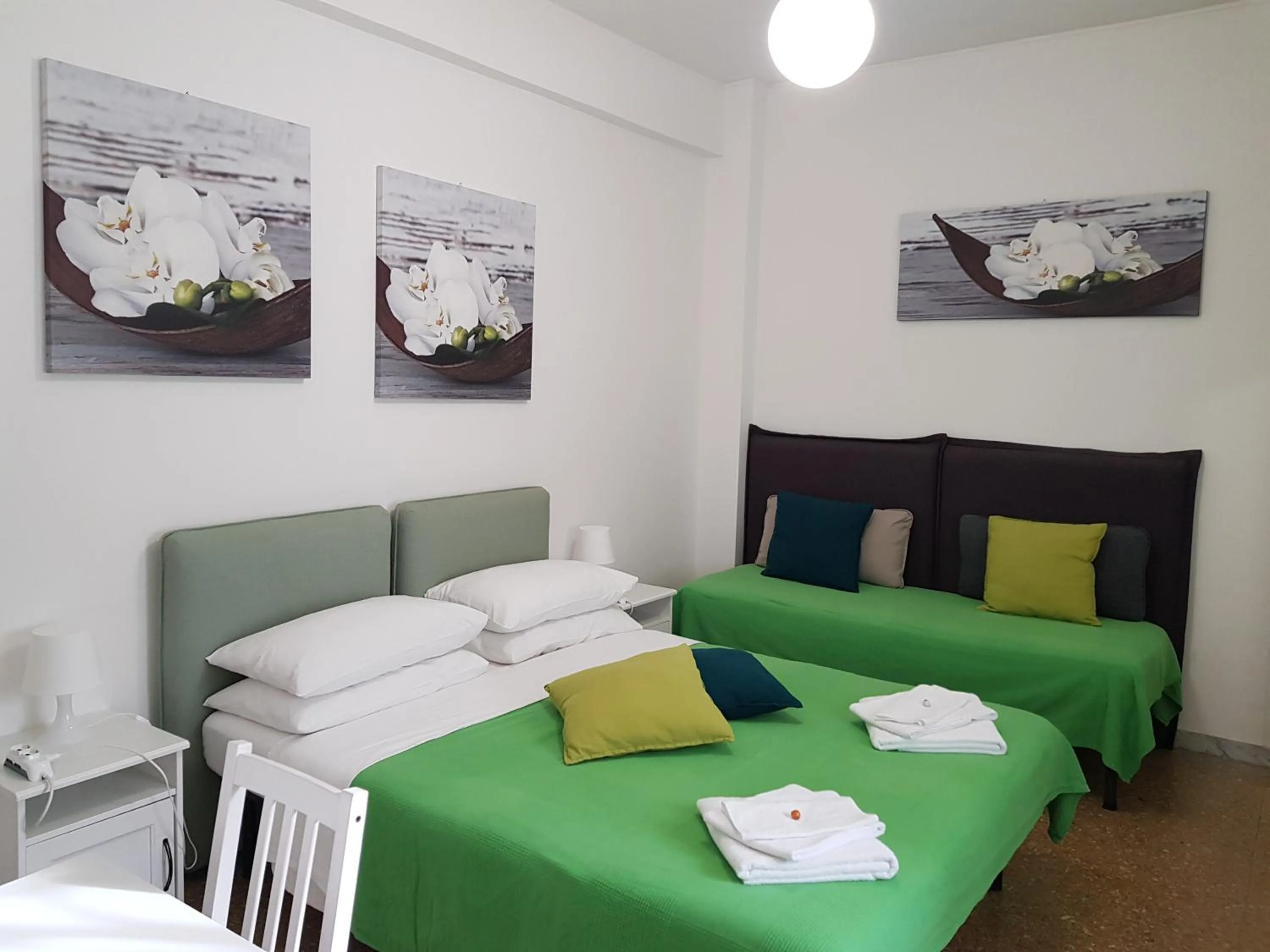 Bed in Rose Antiche Vatican B&B