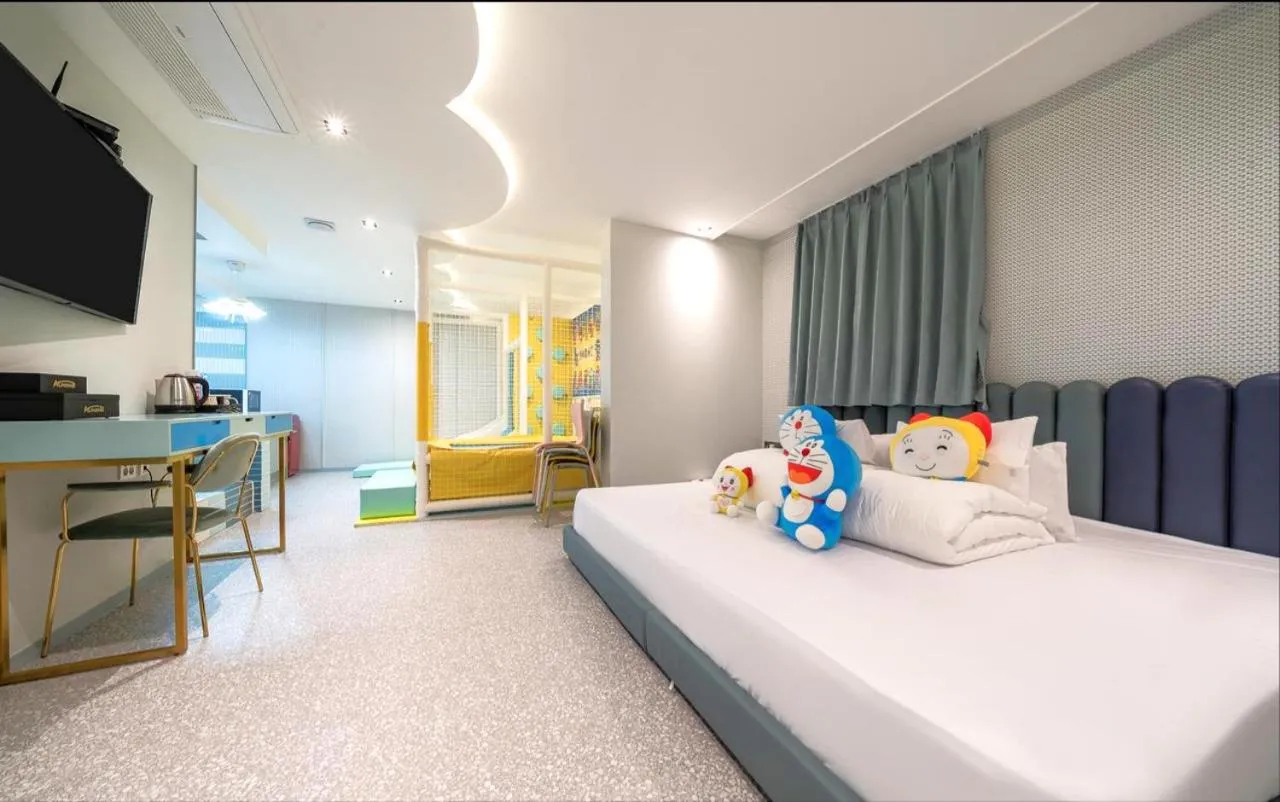 Bed in Jangyu Almond Kids Hotel