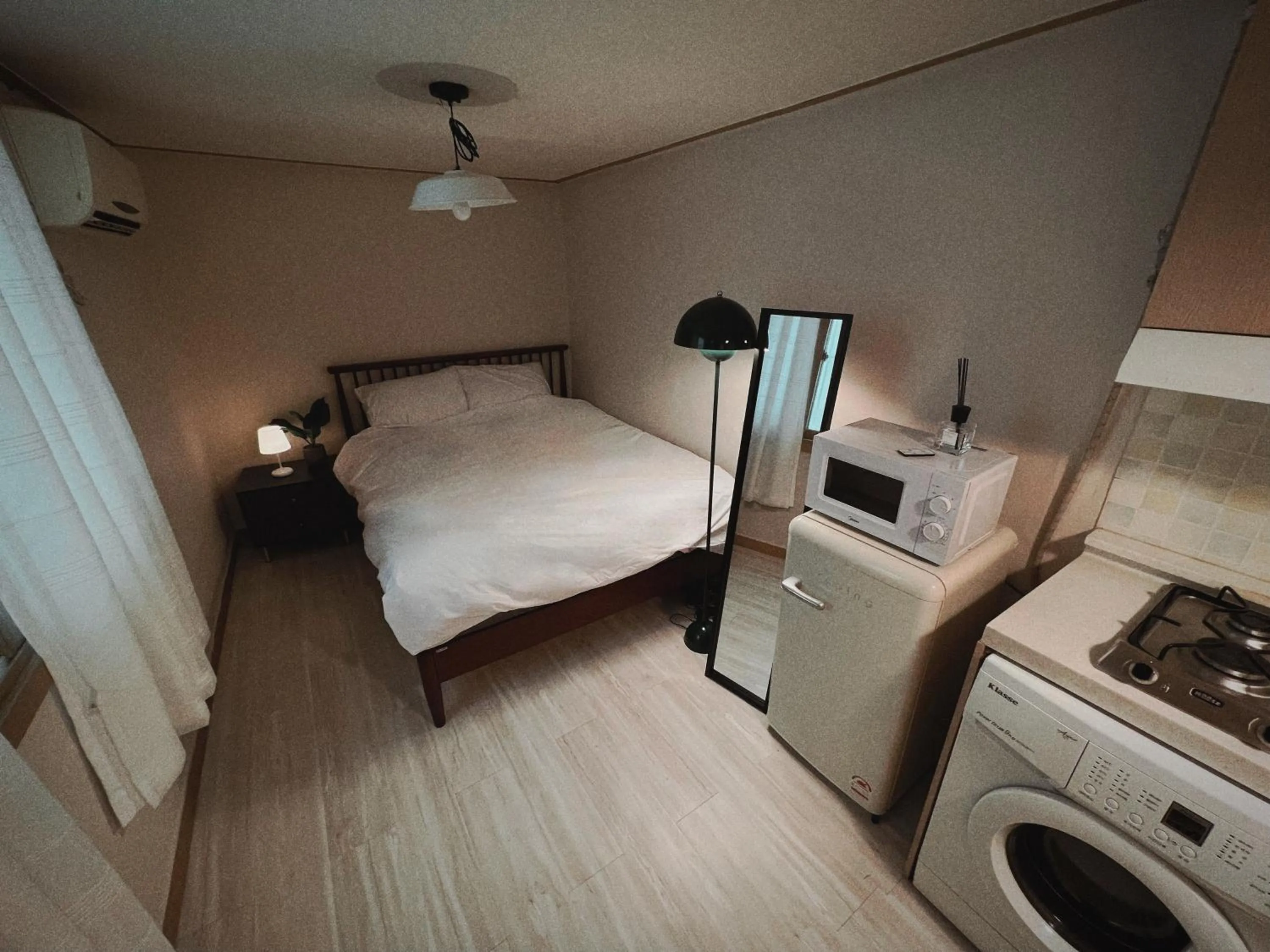 washing machine, Bed in Jnineguesthouse