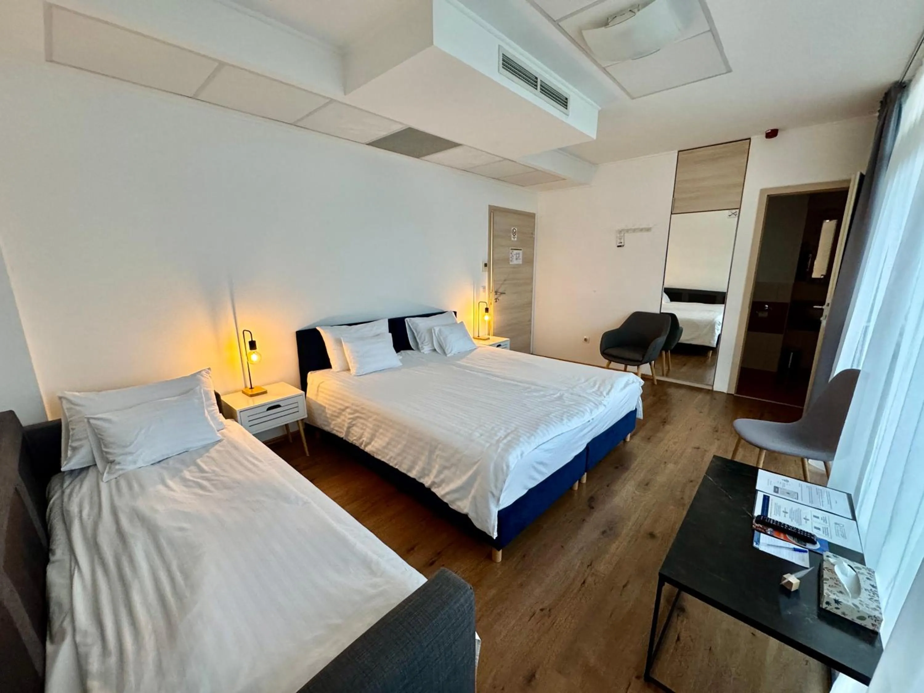 Bed in Rooftop City Residence