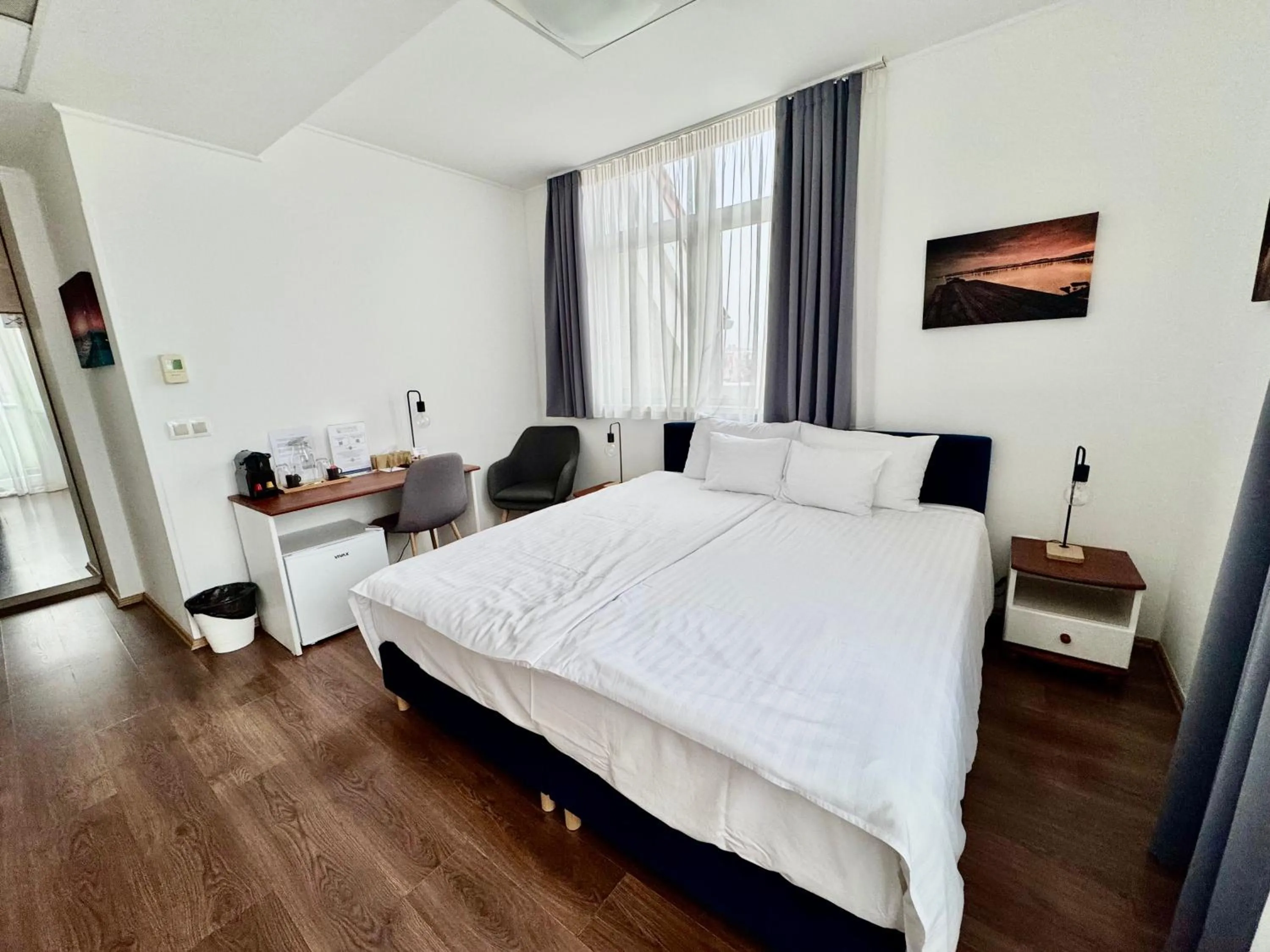 Bed in Rooftop City Residence