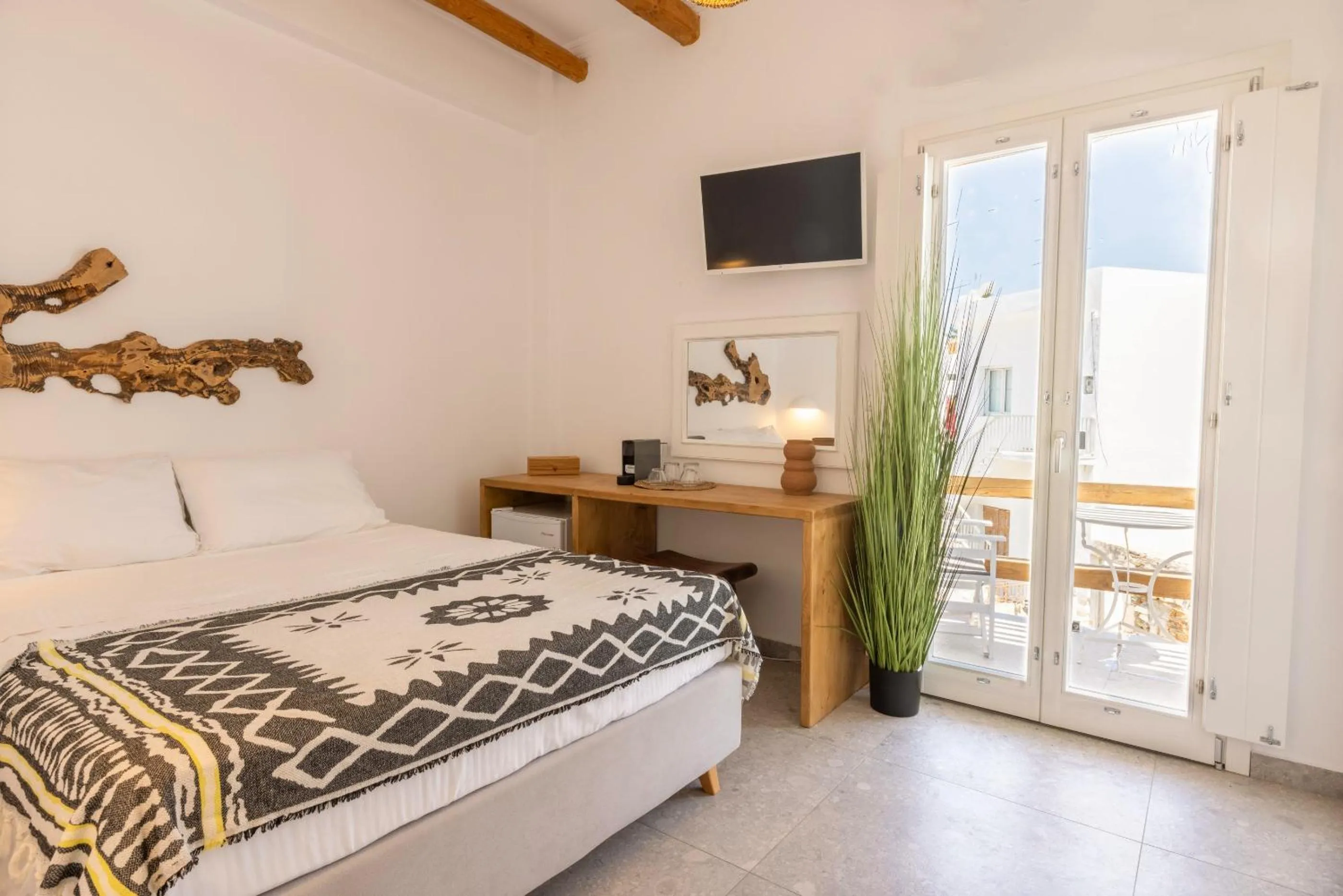 Bed in Parosquare Central Suites