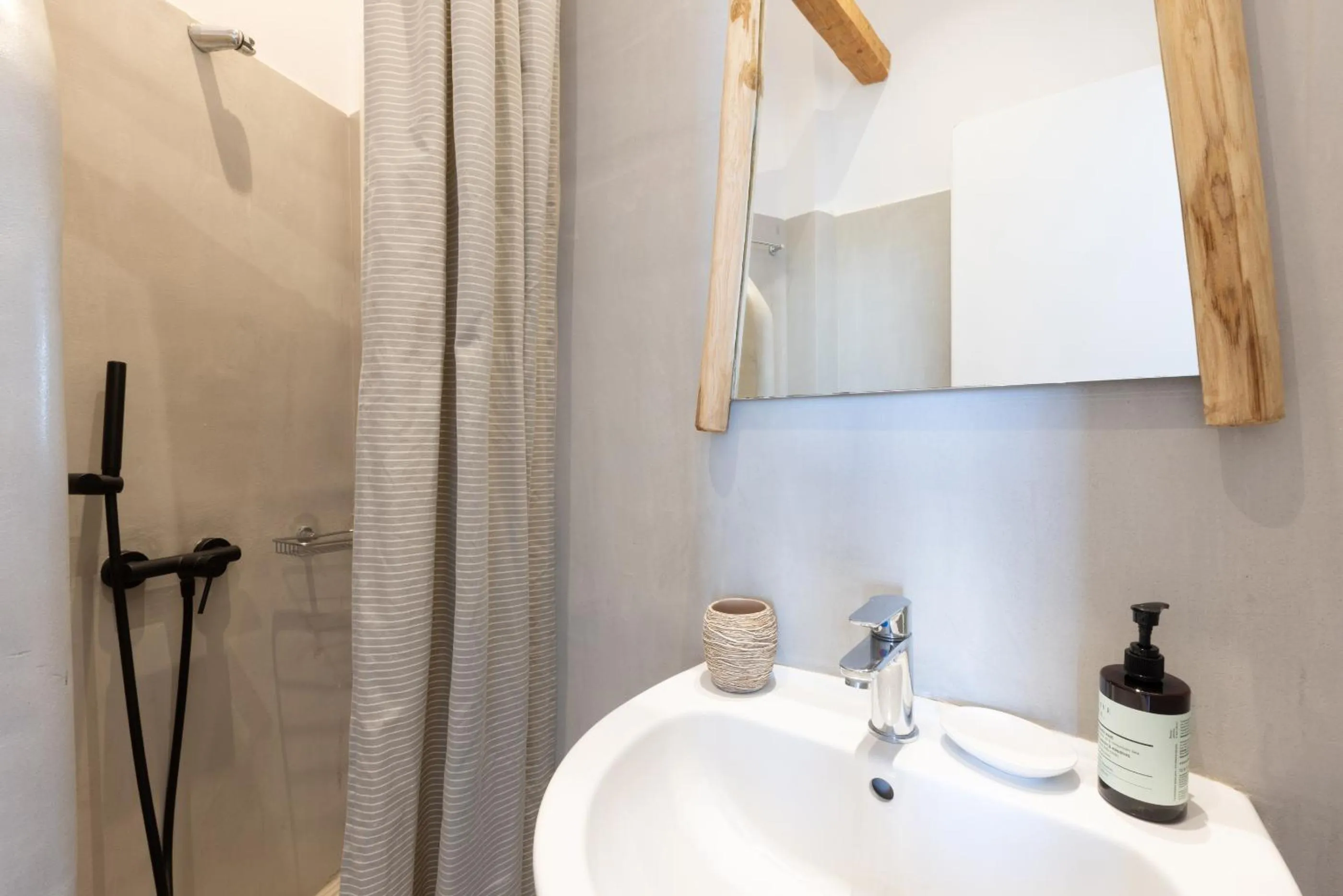 Shower in Parosquare Central Suites