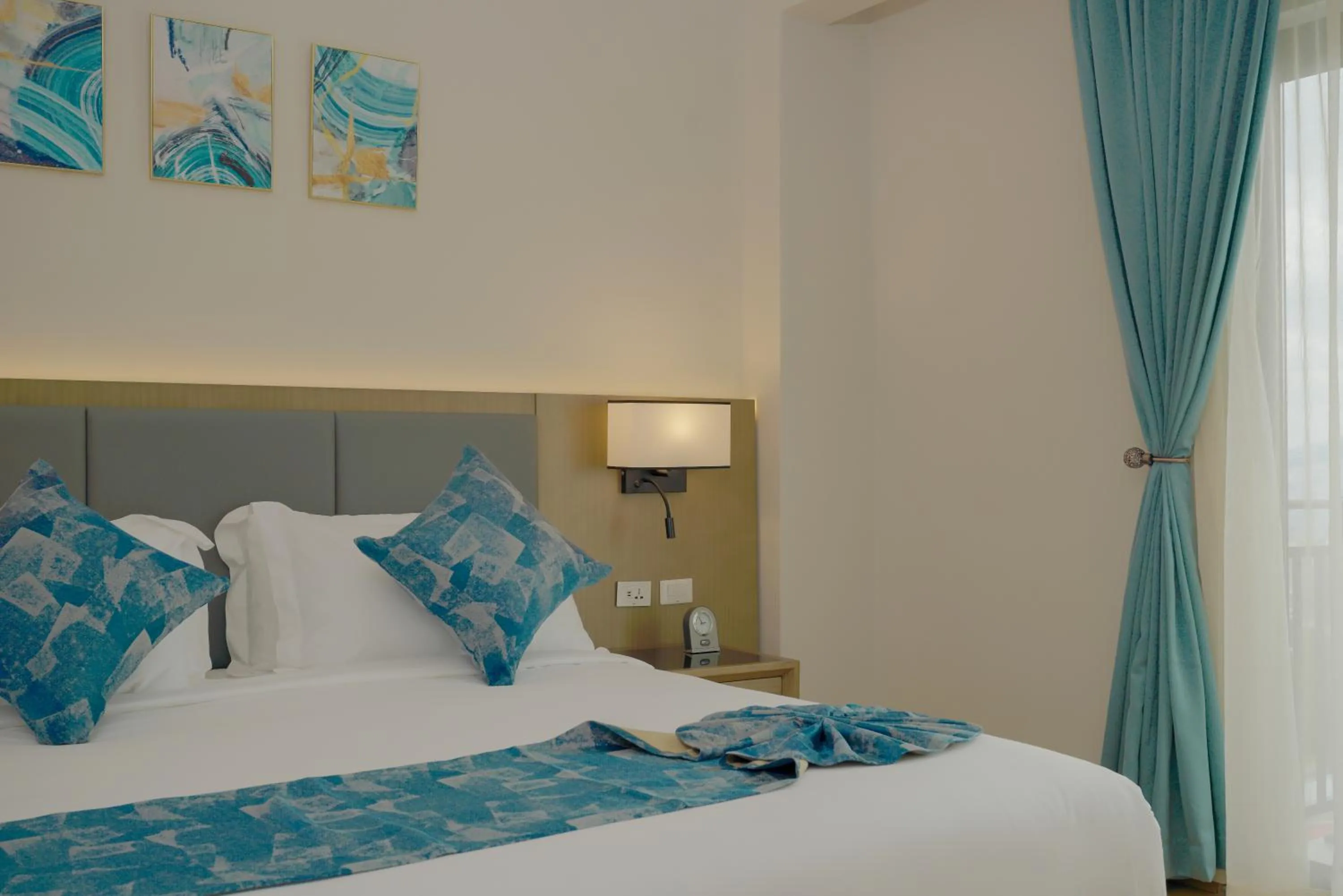 Bed in Stay Easy Plus Hotel