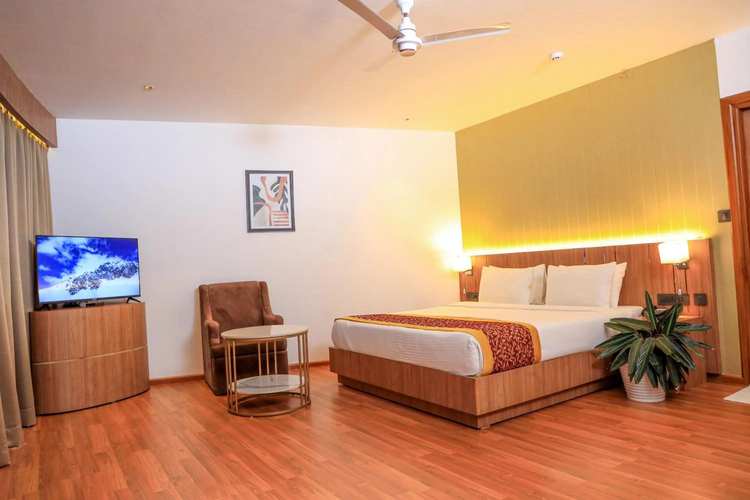 Communal lounge/ TV room, Bed in Hotel Sky Sierra Wayanad