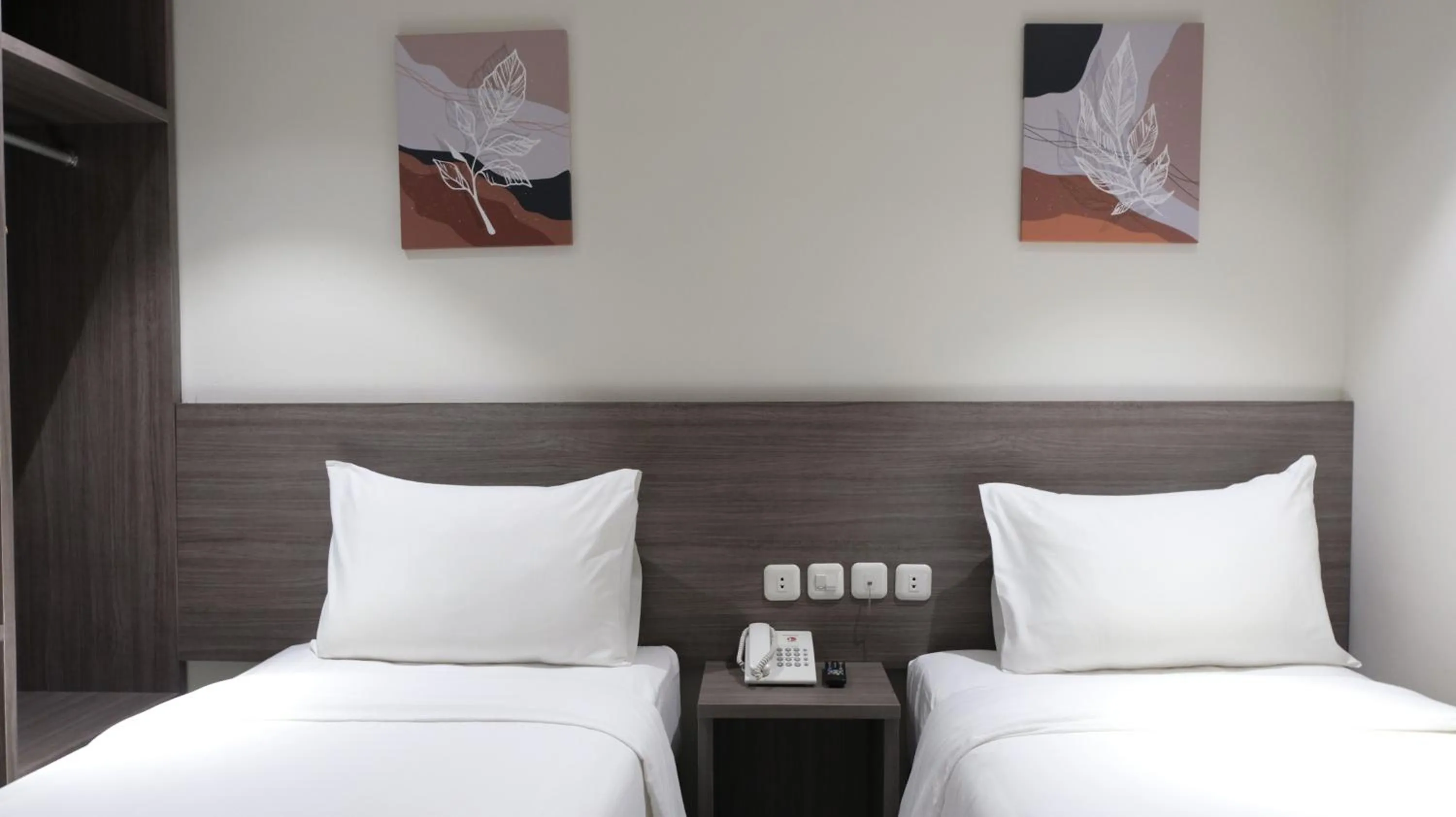 Bed in Lun Hotel Manado