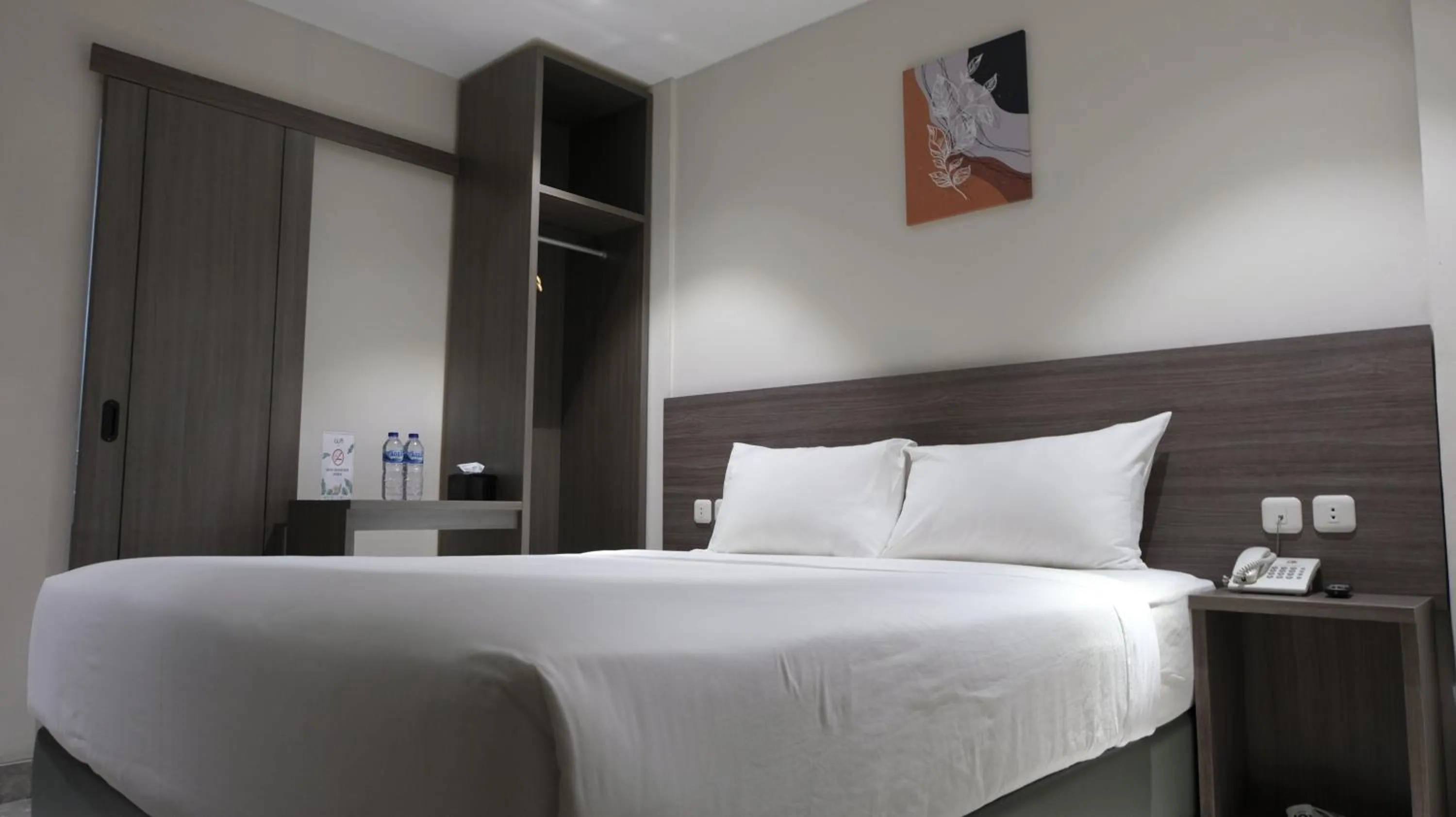 Bed in Lun Hotel Manado