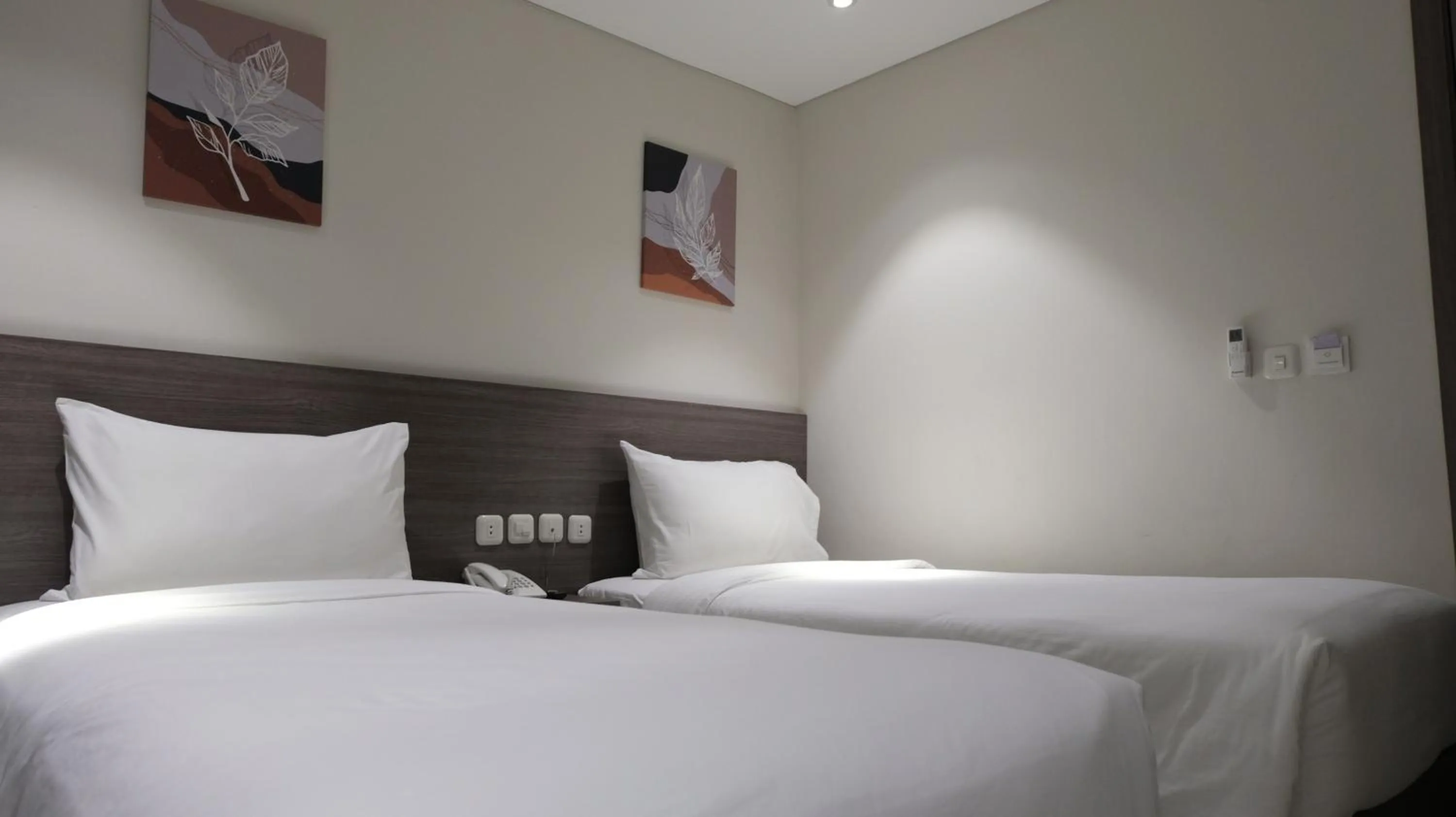 Bed in Lun Hotel Manado