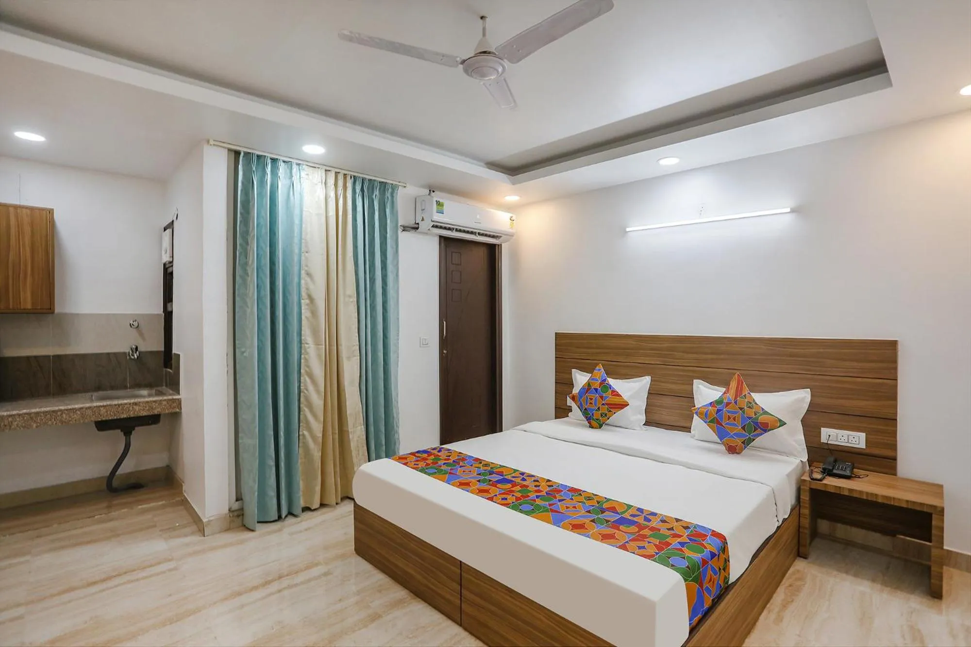 Bed in FabHotel Unique Stay