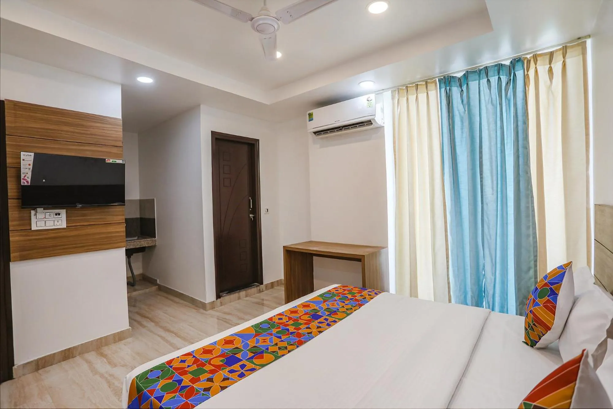 Bed in FabHotel Unique Stay