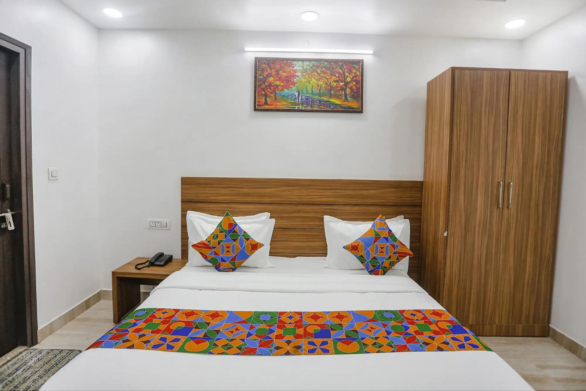 Bed in FabHotel Unique Stay