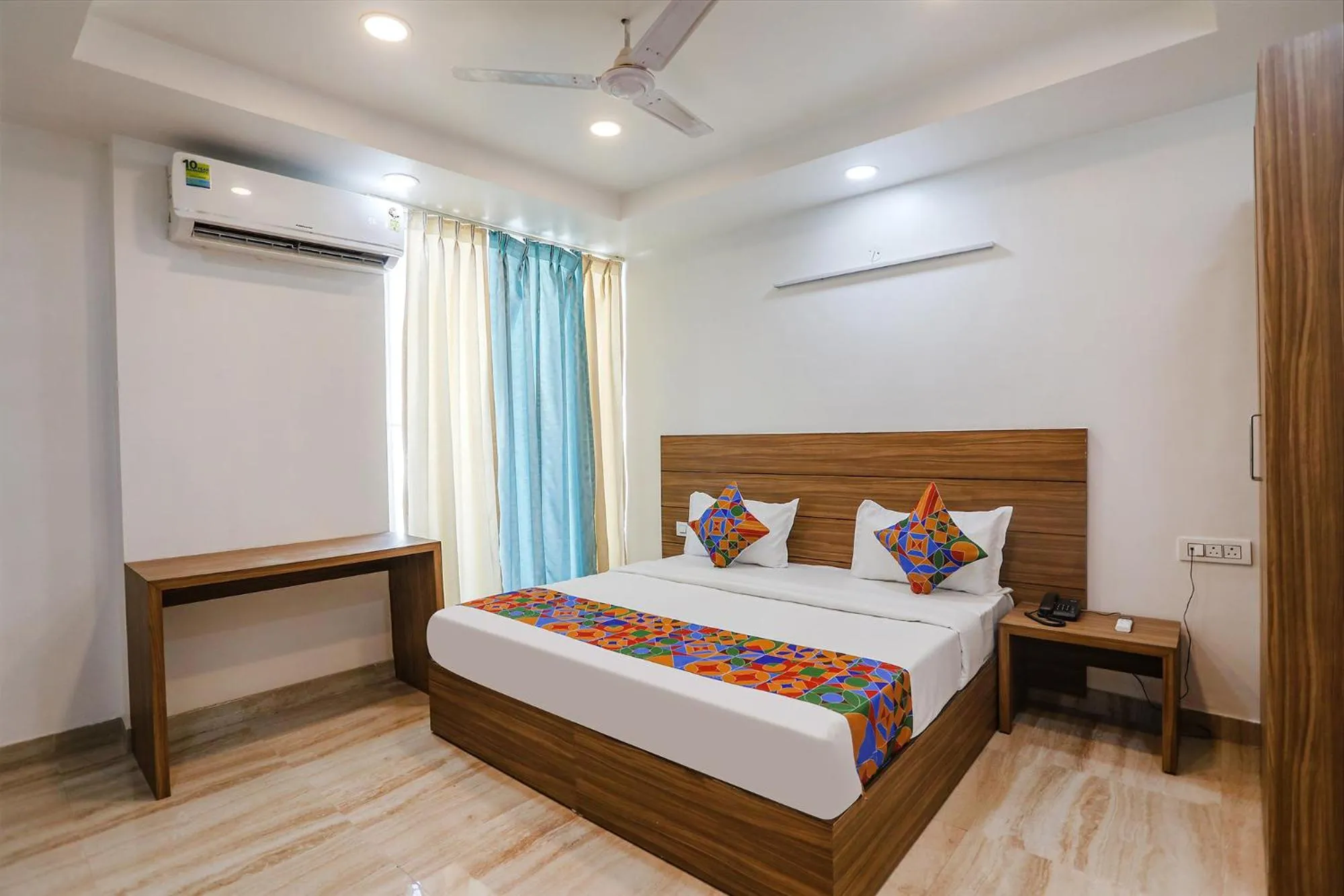 Bed in FabHotel Unique Stay