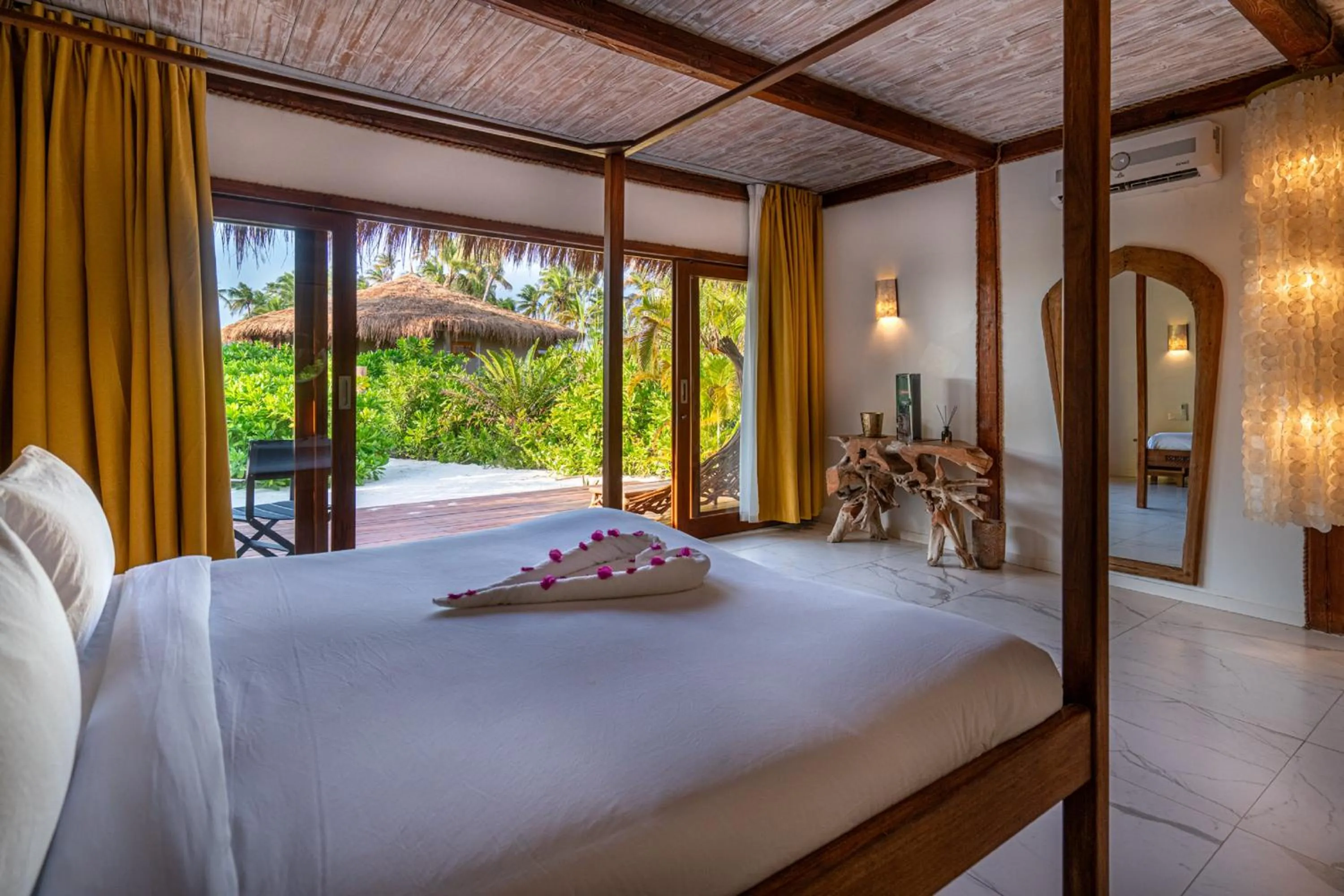 Bed in Sensations Eco-Chic Hotel