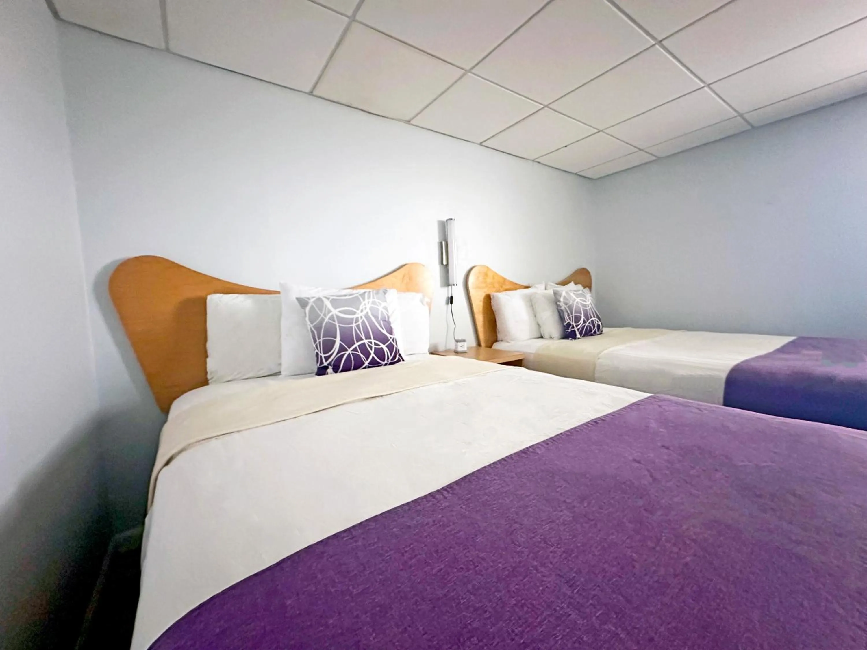 Bed in Shalimar Resort