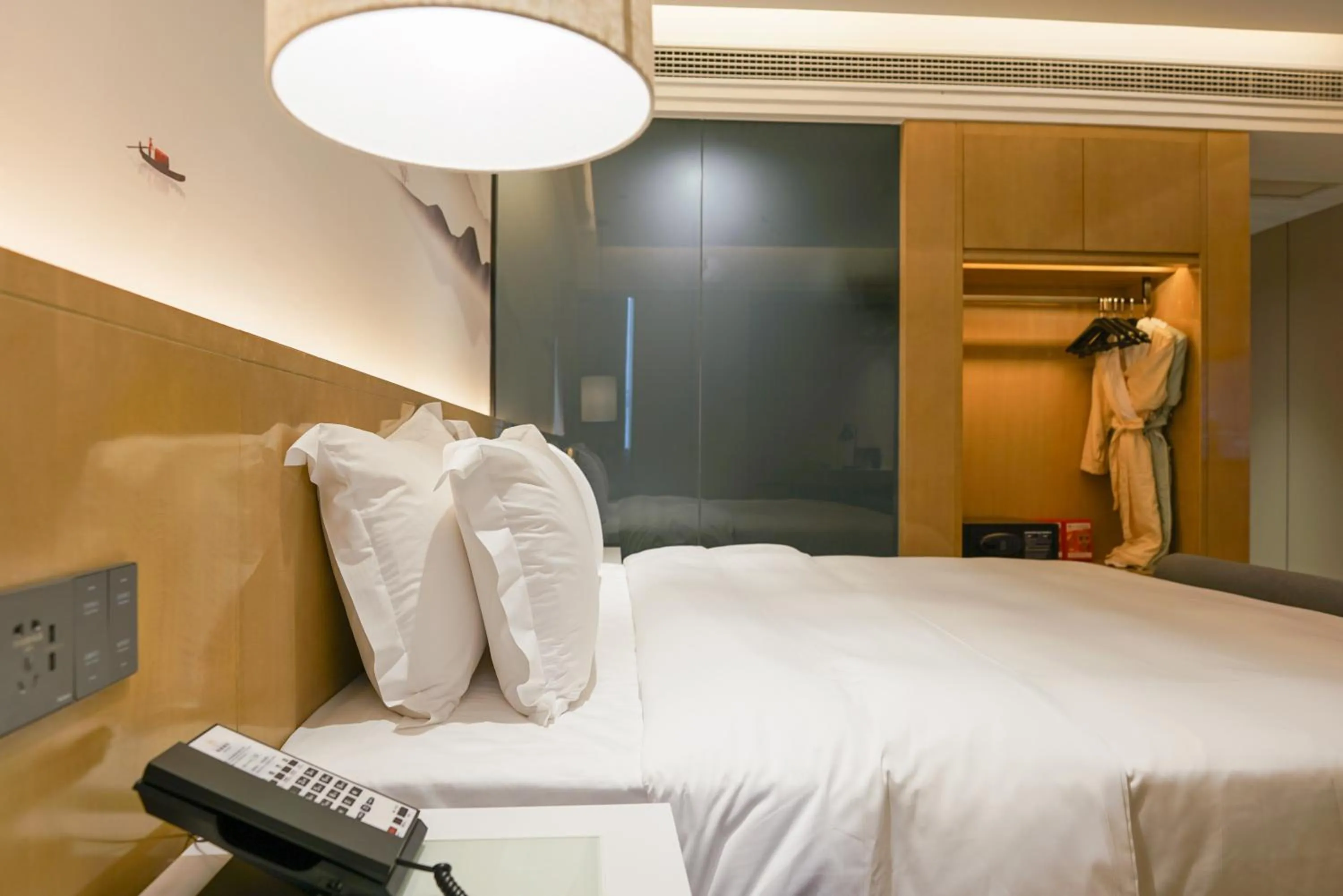 Bed in Paco Hotel Shenzhen Luohu Port