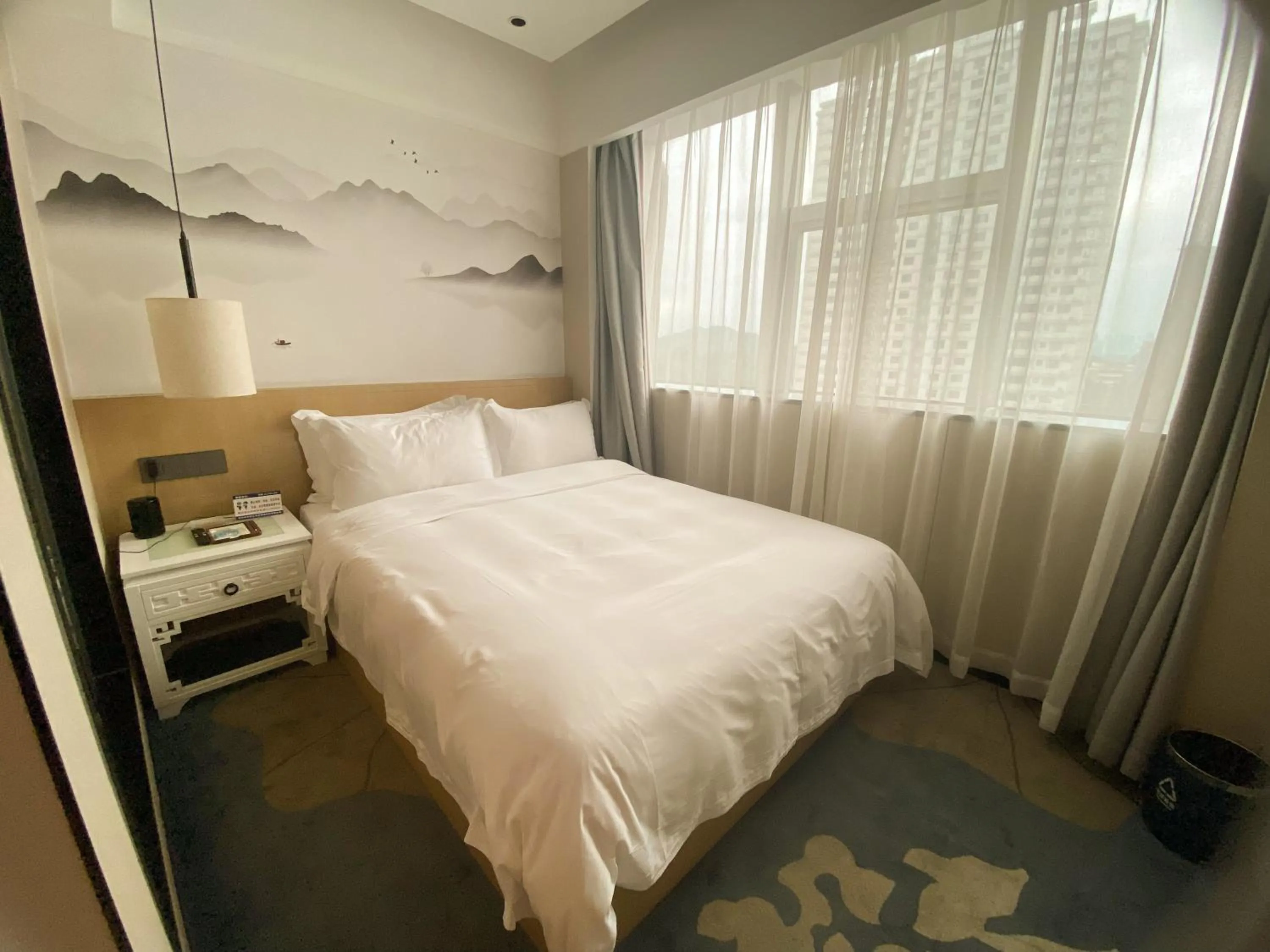 Bed in Paco Hotel Shenzhen Luohu Port