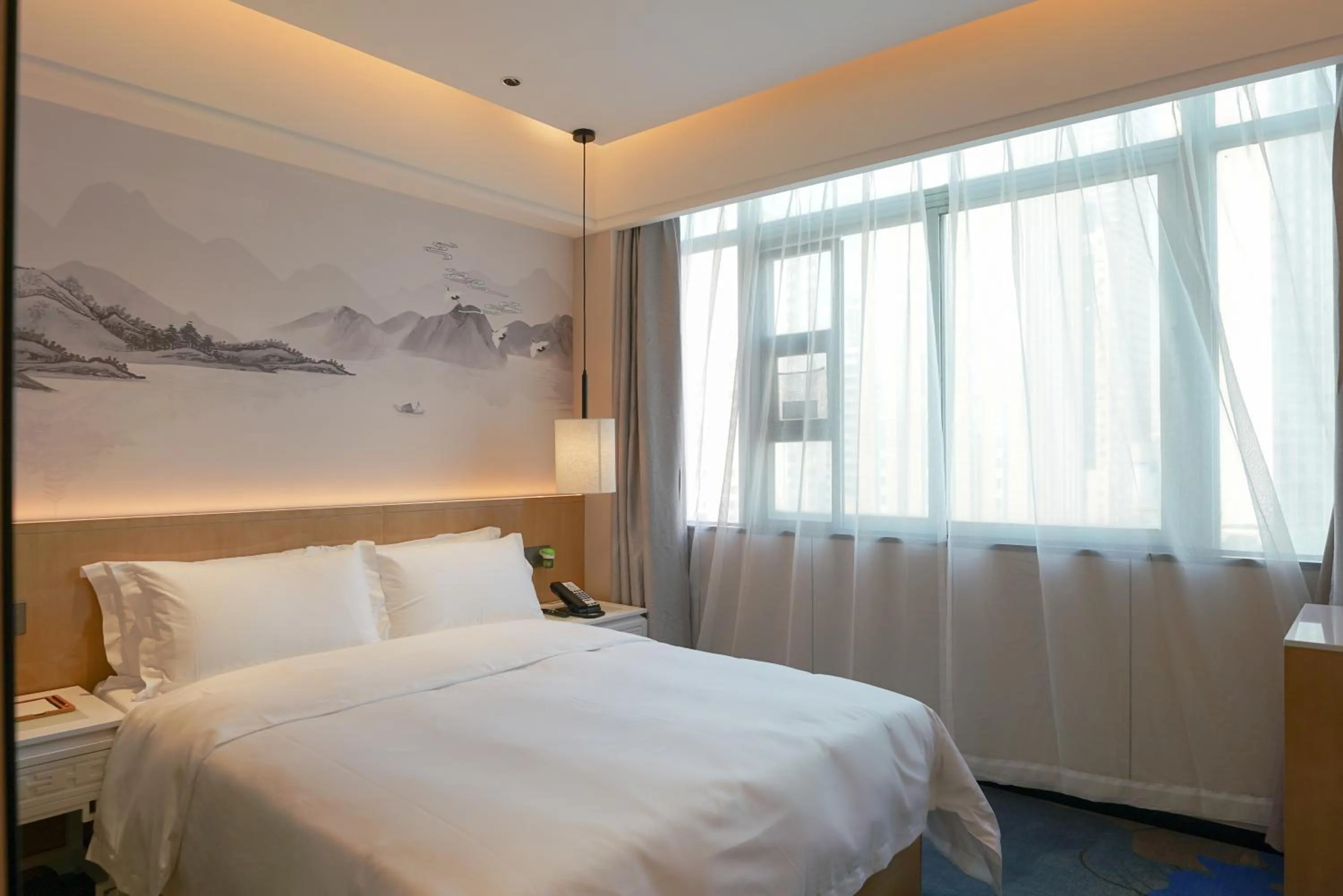 Bed in Paco Hotel Shenzhen Luohu Port