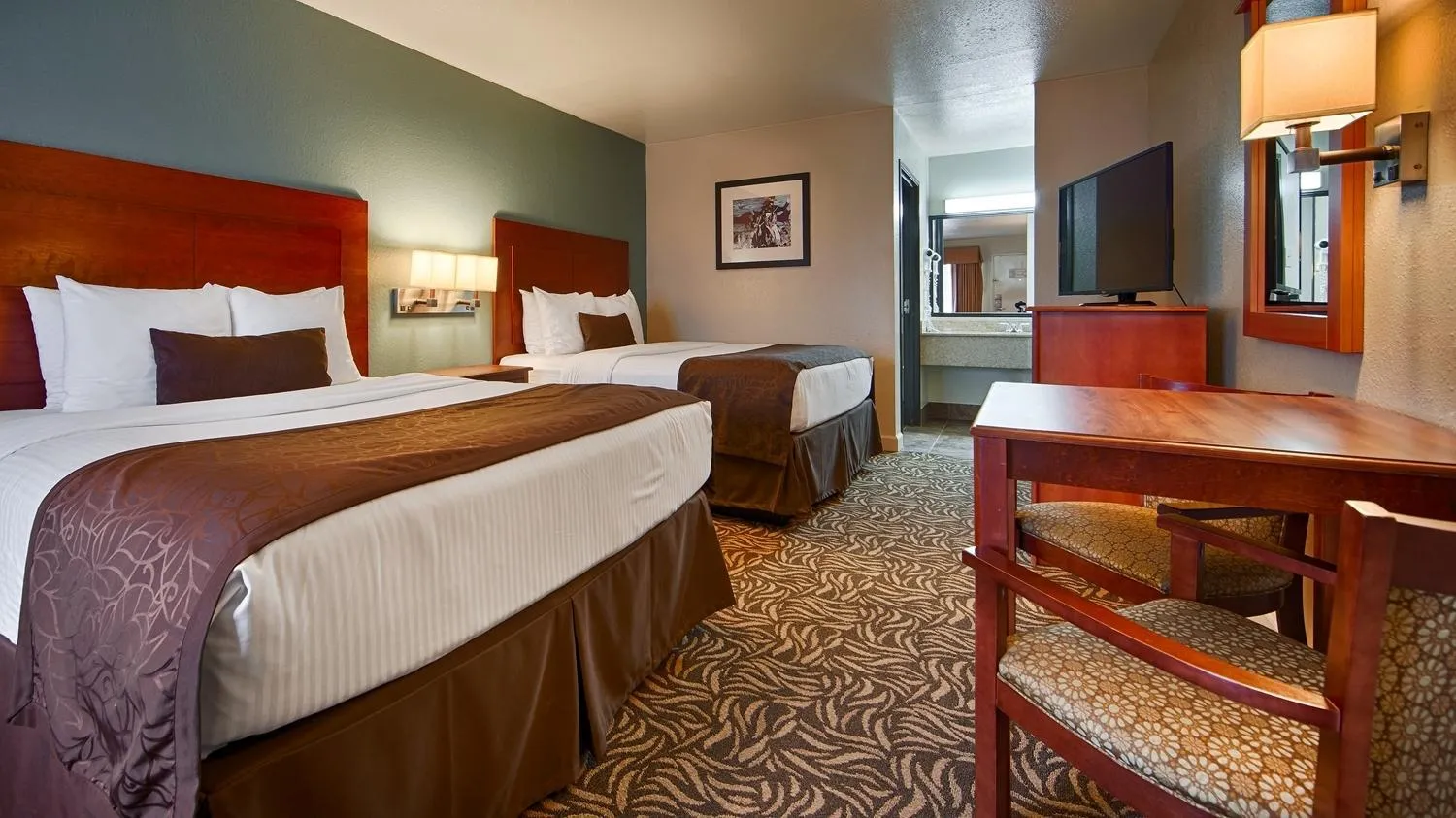 Queen Room with Two Queen Beds with Roll in Shower in Best Western Regency Inn & Suites