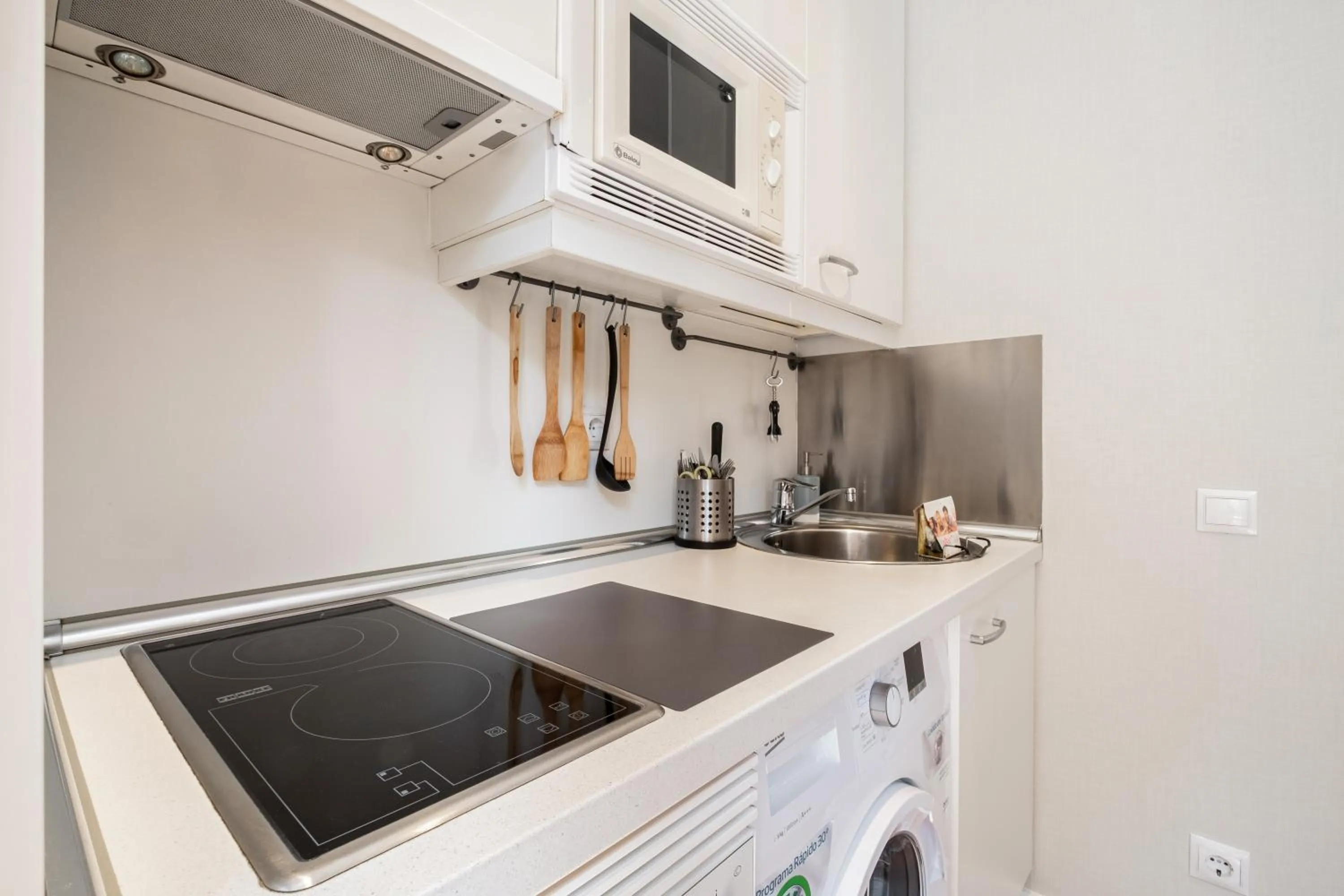Kitchen or kitchenette in Apartamentos Cruz