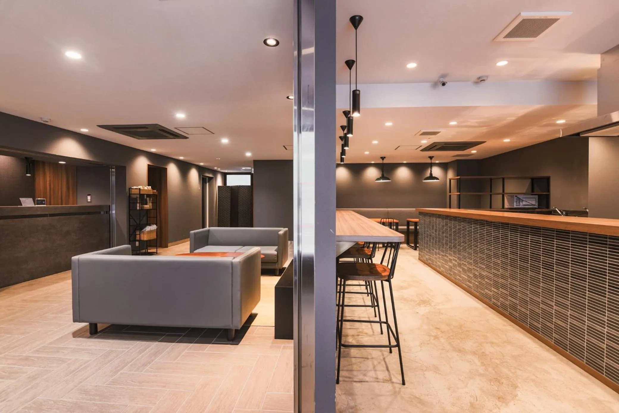 Communal lounge/ TV room in WAYFARER Shinsaibashi