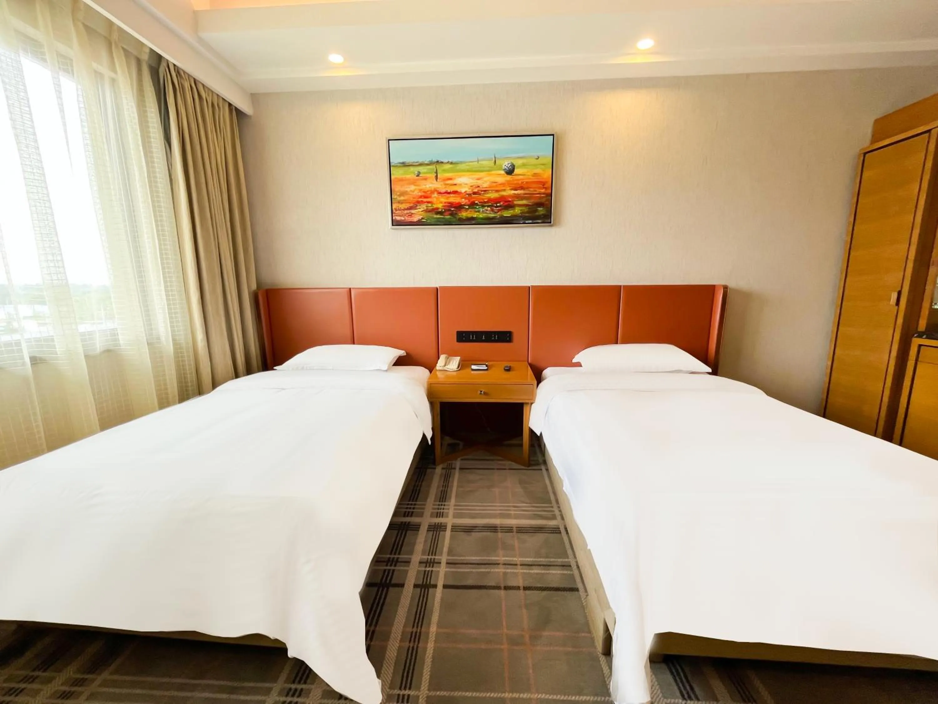 Bed in Jinrui Sunshine Hotel Pengzhou