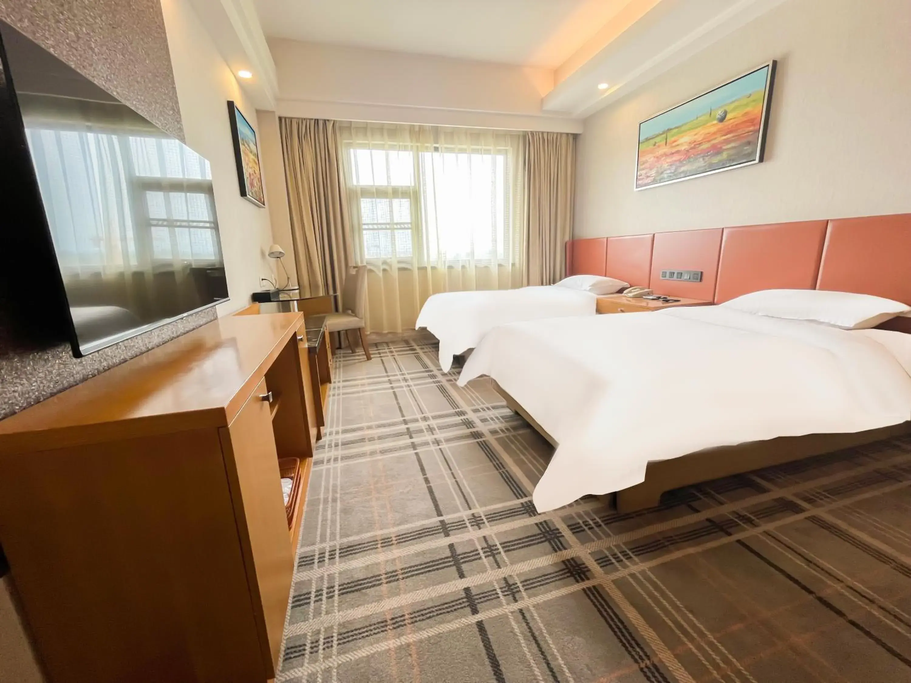 Deluxe Twin Room in Jinrui Sunshine Hotel Pengzhou Deluxe Twin Room in Jinrui Sunshine Hotel Pengzhou