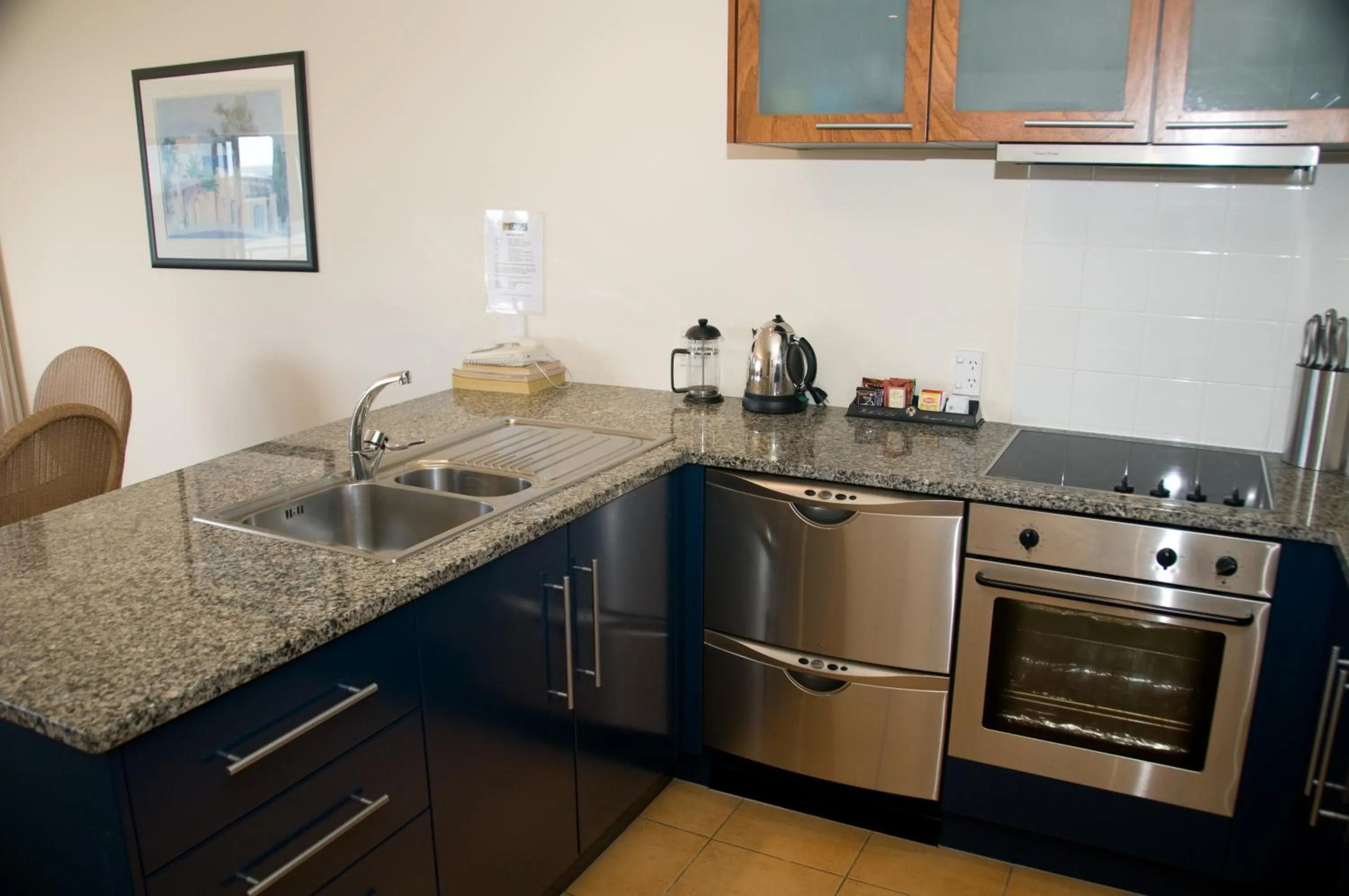 Kitchen or kitchenette in The Reef Beachfront Apartments